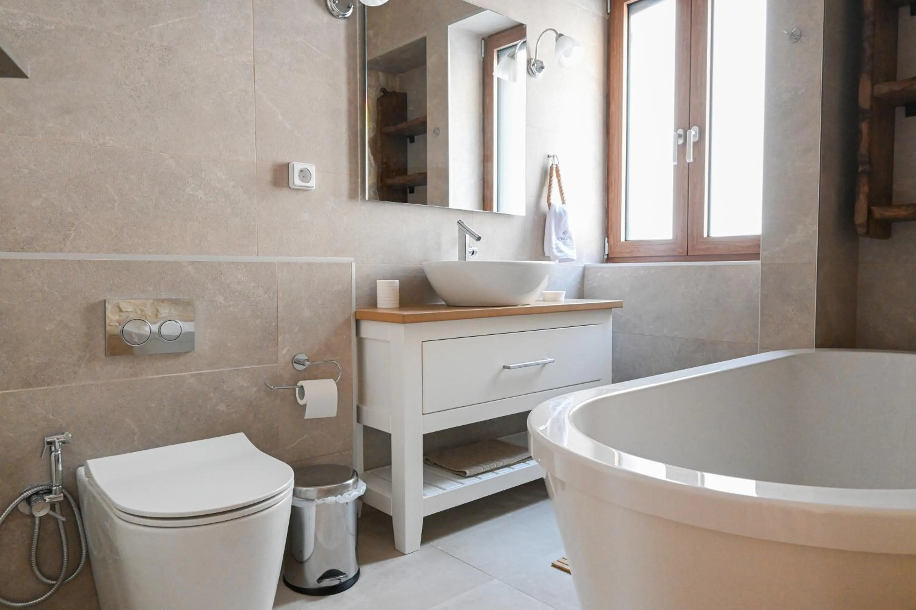 Bathroom in Komody Apartments