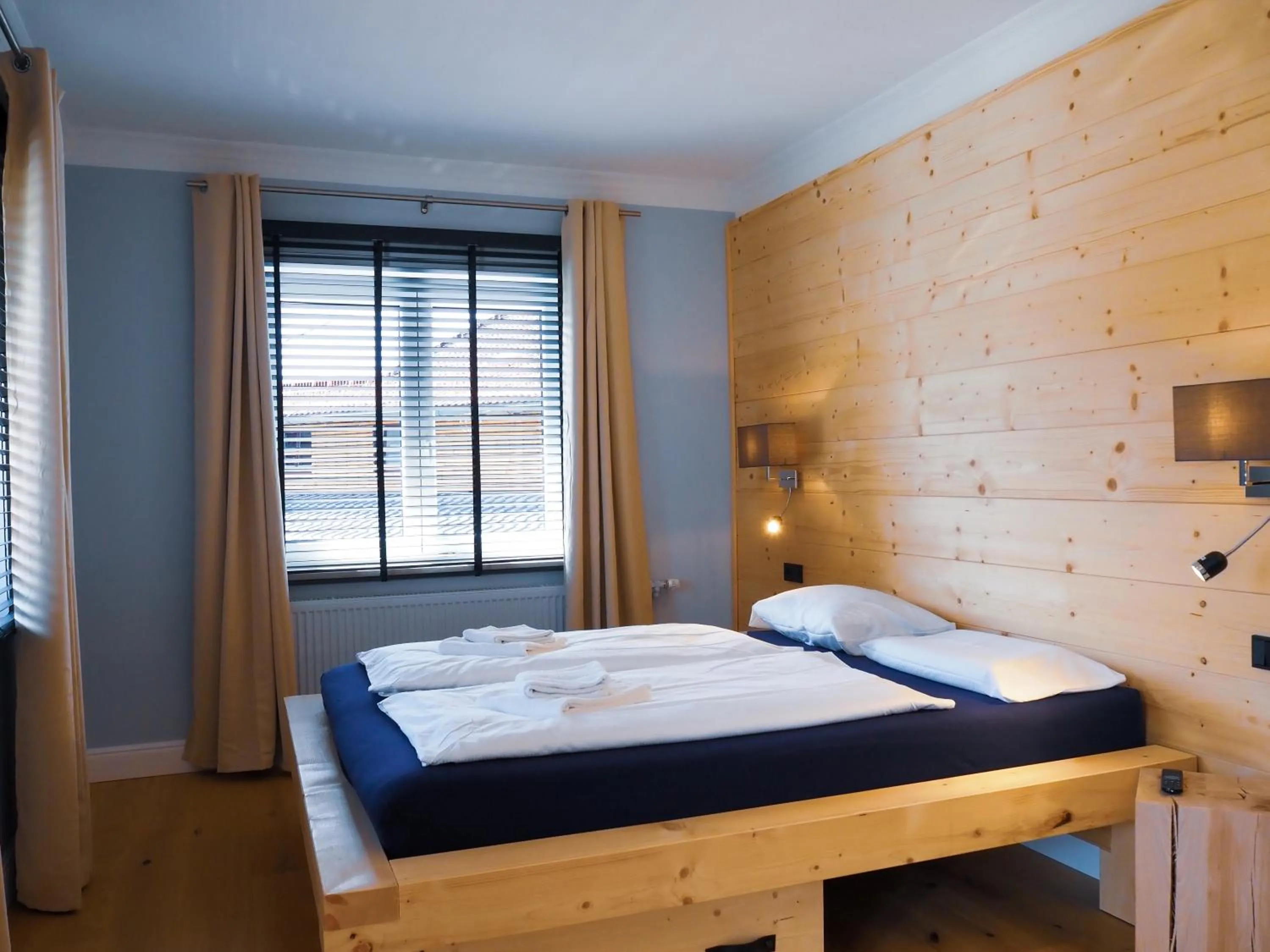 Bedroom, Bed in Design Hotel ALPENLIEBE - - - - Boutique-Flair - - - -