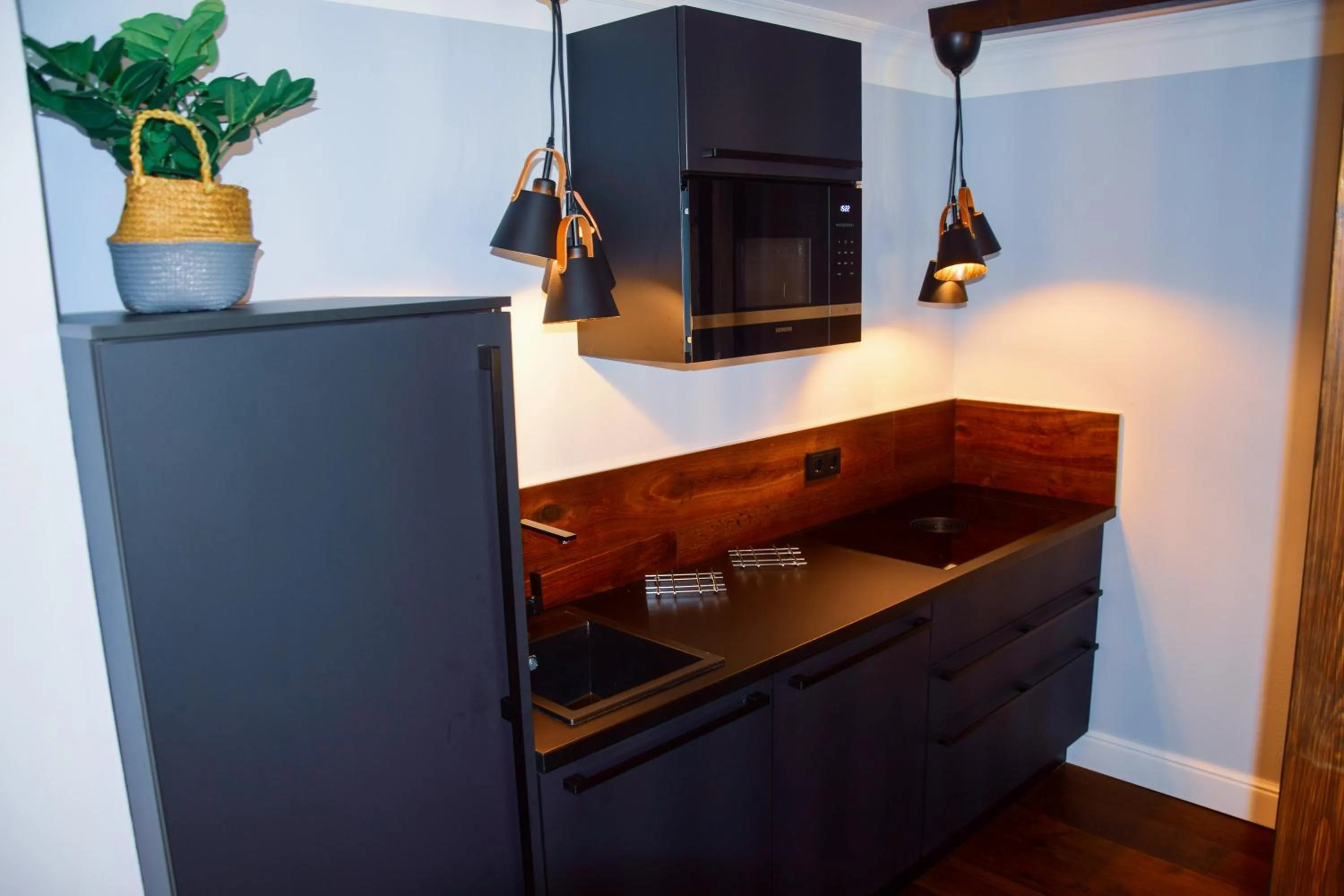 Kitchen or kitchenette in Design Hotel ALPENLIEBE - - - - Boutique-Flair - - - -