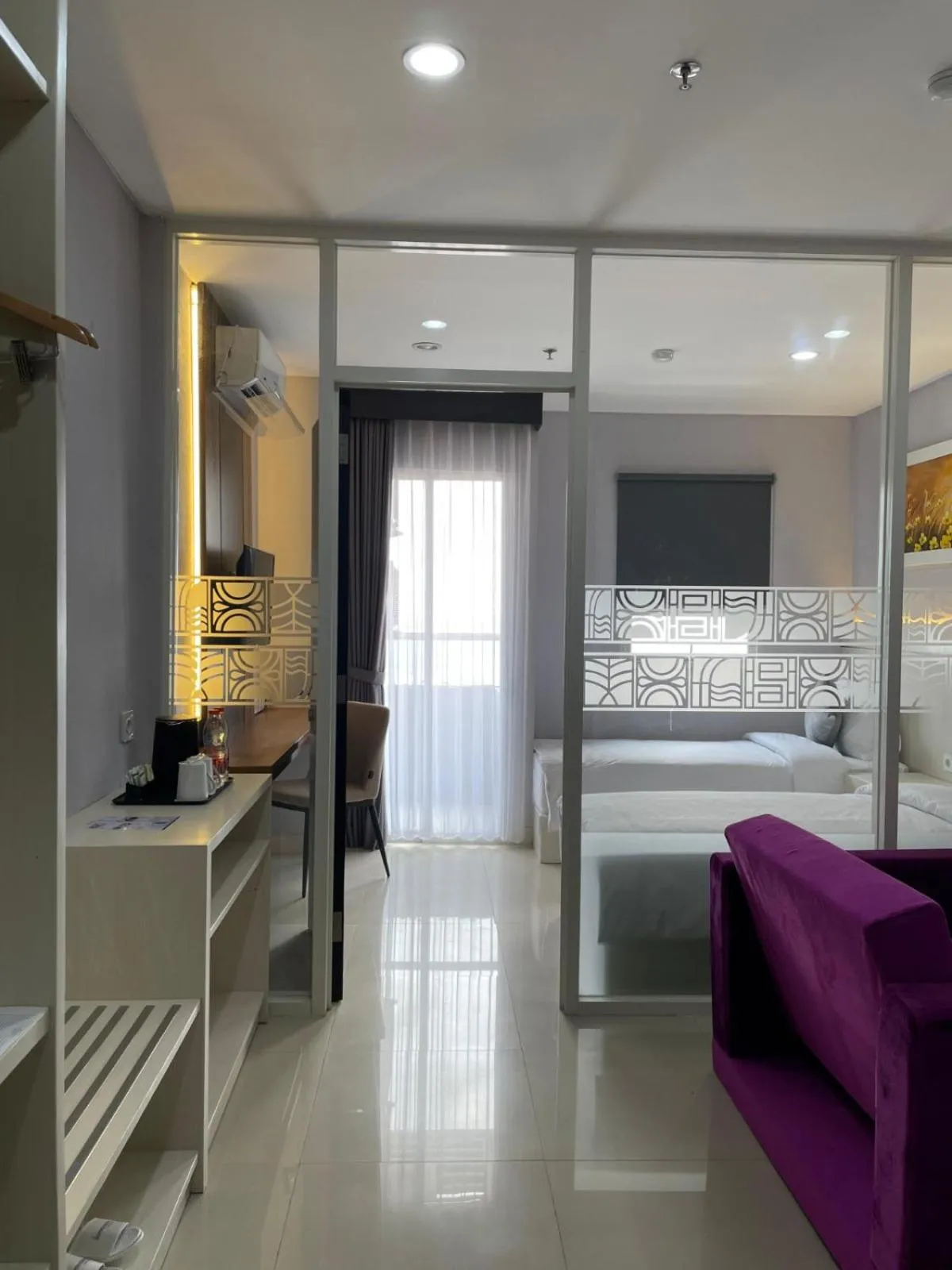 Living room, Bed in Daima Suites Margonda