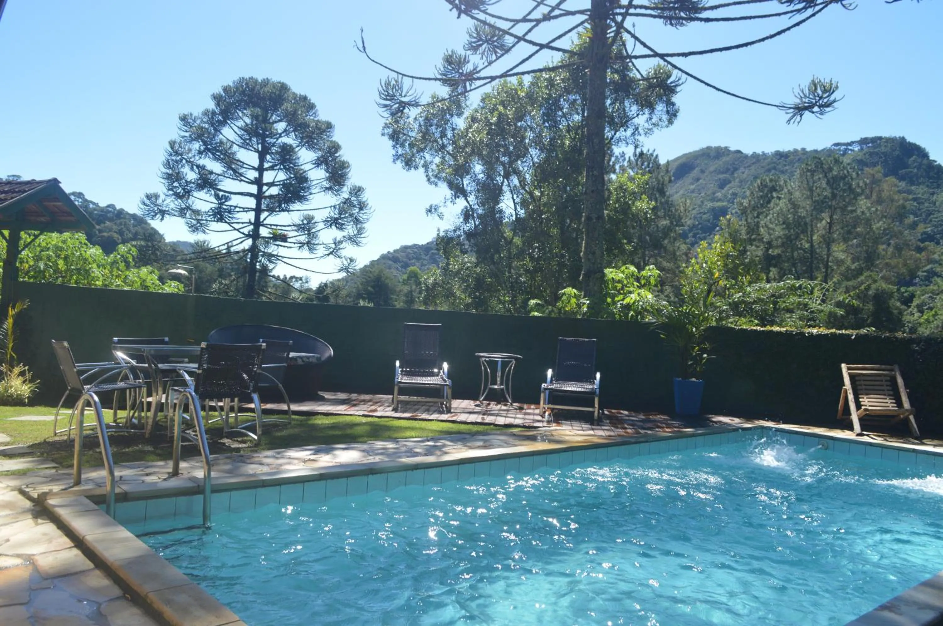 Swimming pool in Pousada Refúgio das Aves