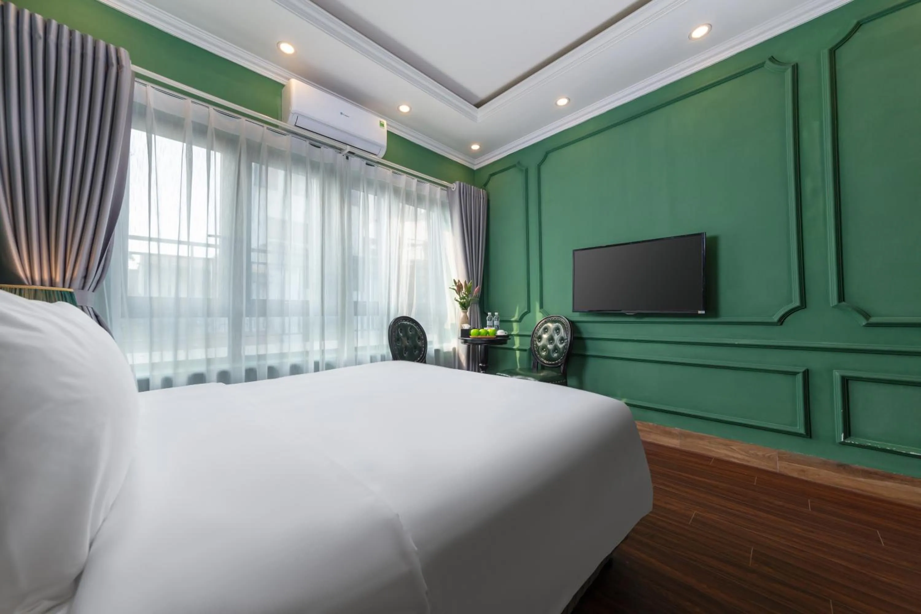 Bed in Madelise Adora Hotel & Travel