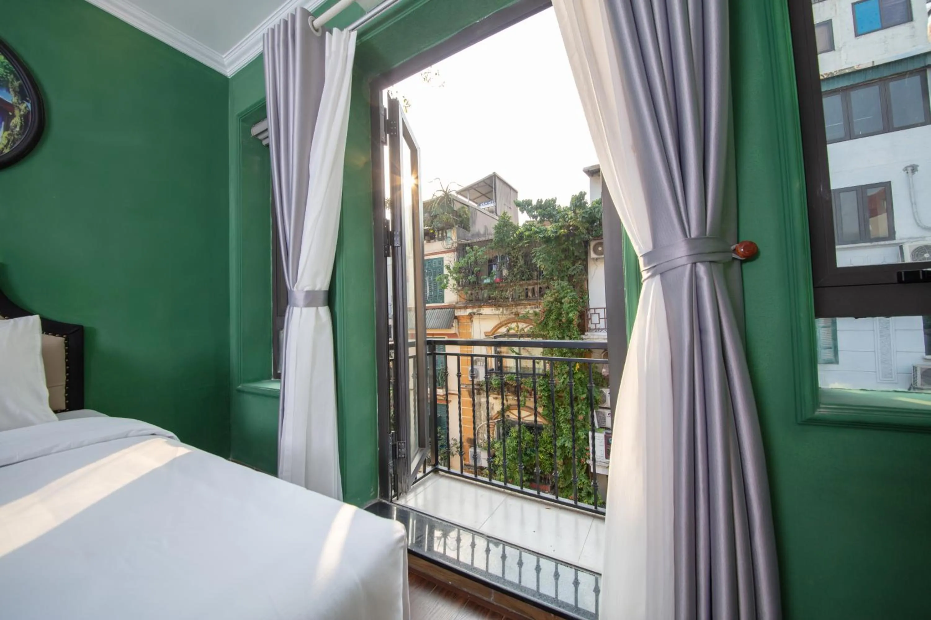 View (from property/room), Bed in Madelise Adora Hotel & Travel