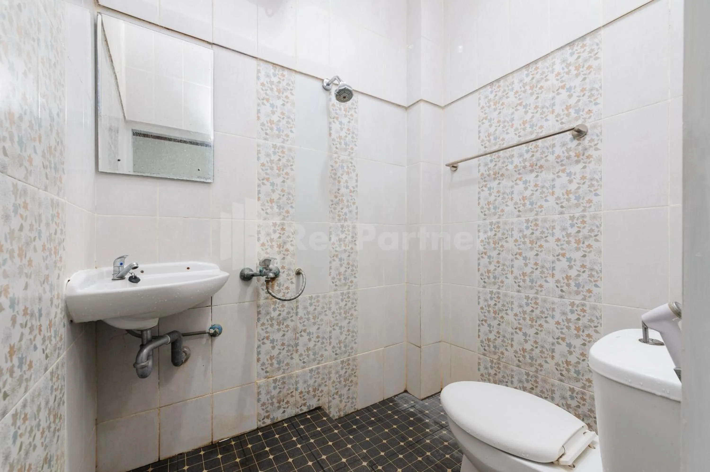 Bathroom in Urbanview Hotel Ian Jaksa Kebon Sirih