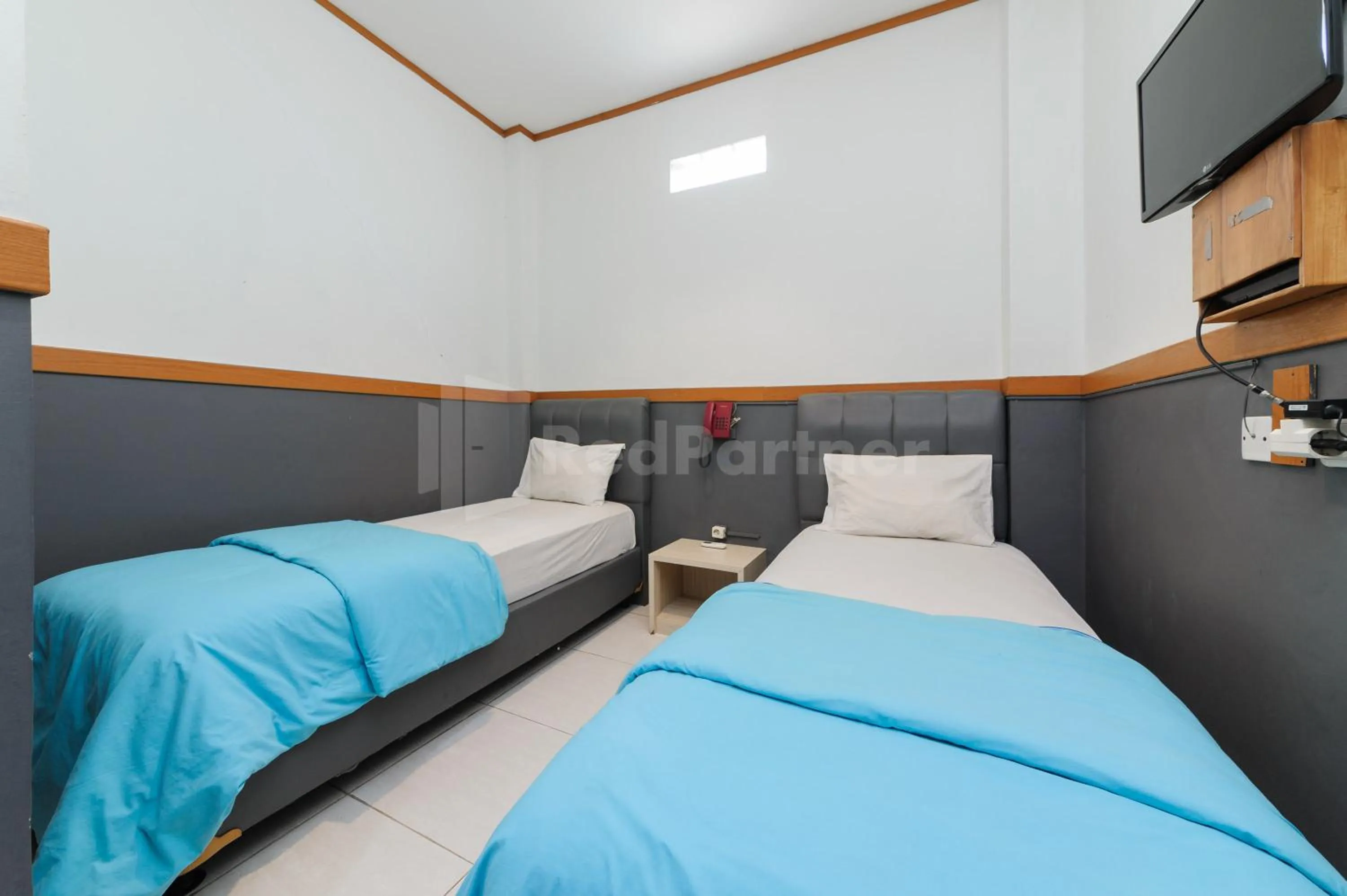 Bedroom, Bed in Urbanview Hotel Ian Jaksa Kebon Sirih