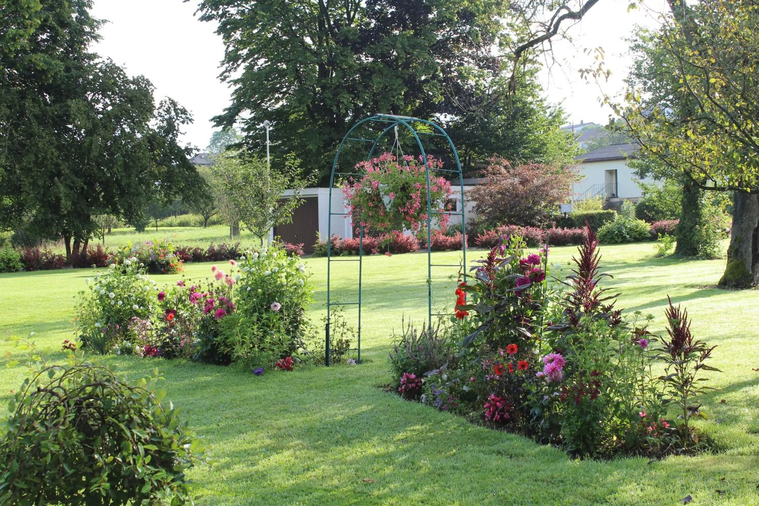 Garden view in Les Petites Chambres de la Bleue Maison