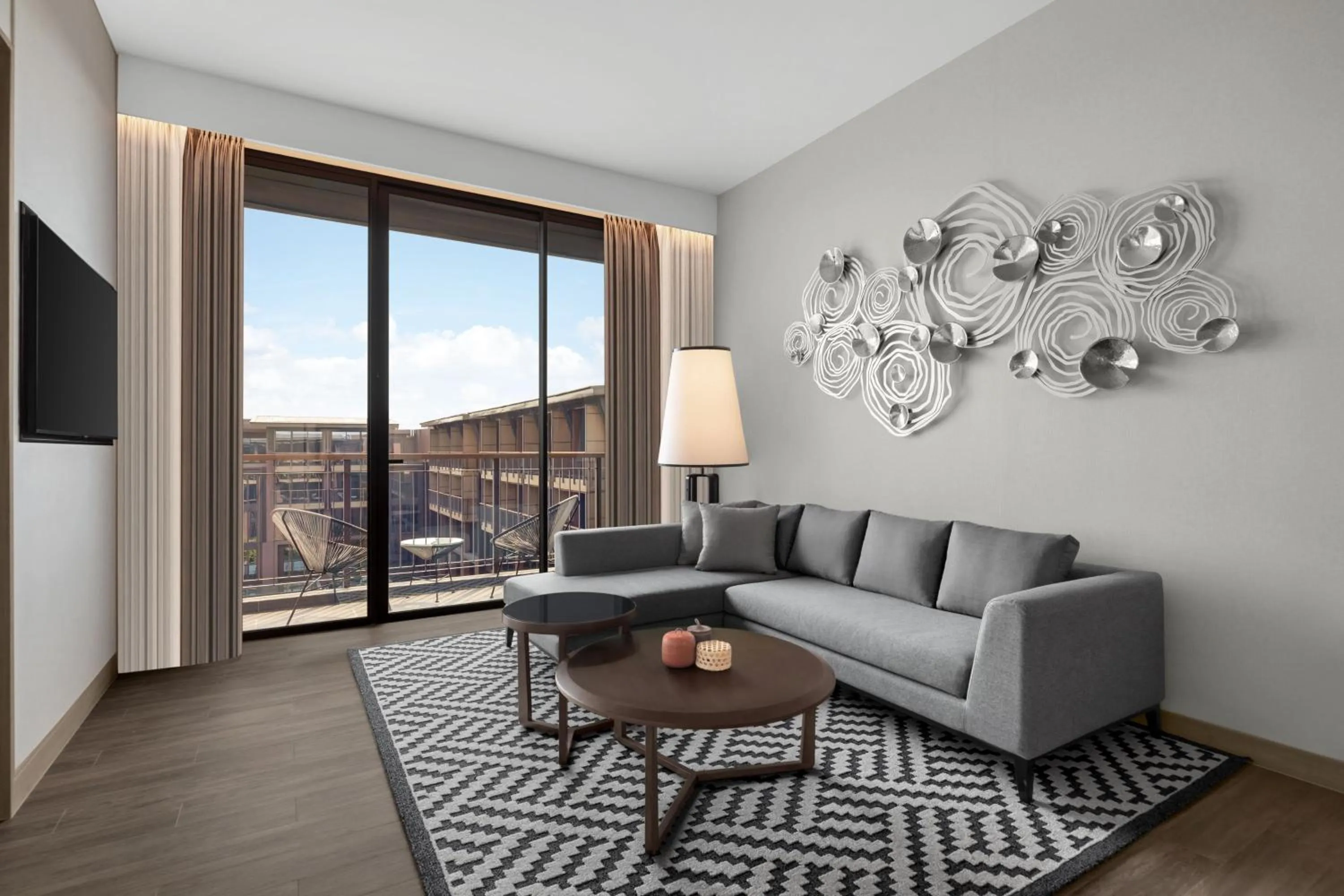 Living room in Courtyard by Marriott Bangkok Suvarnabhumi Airport