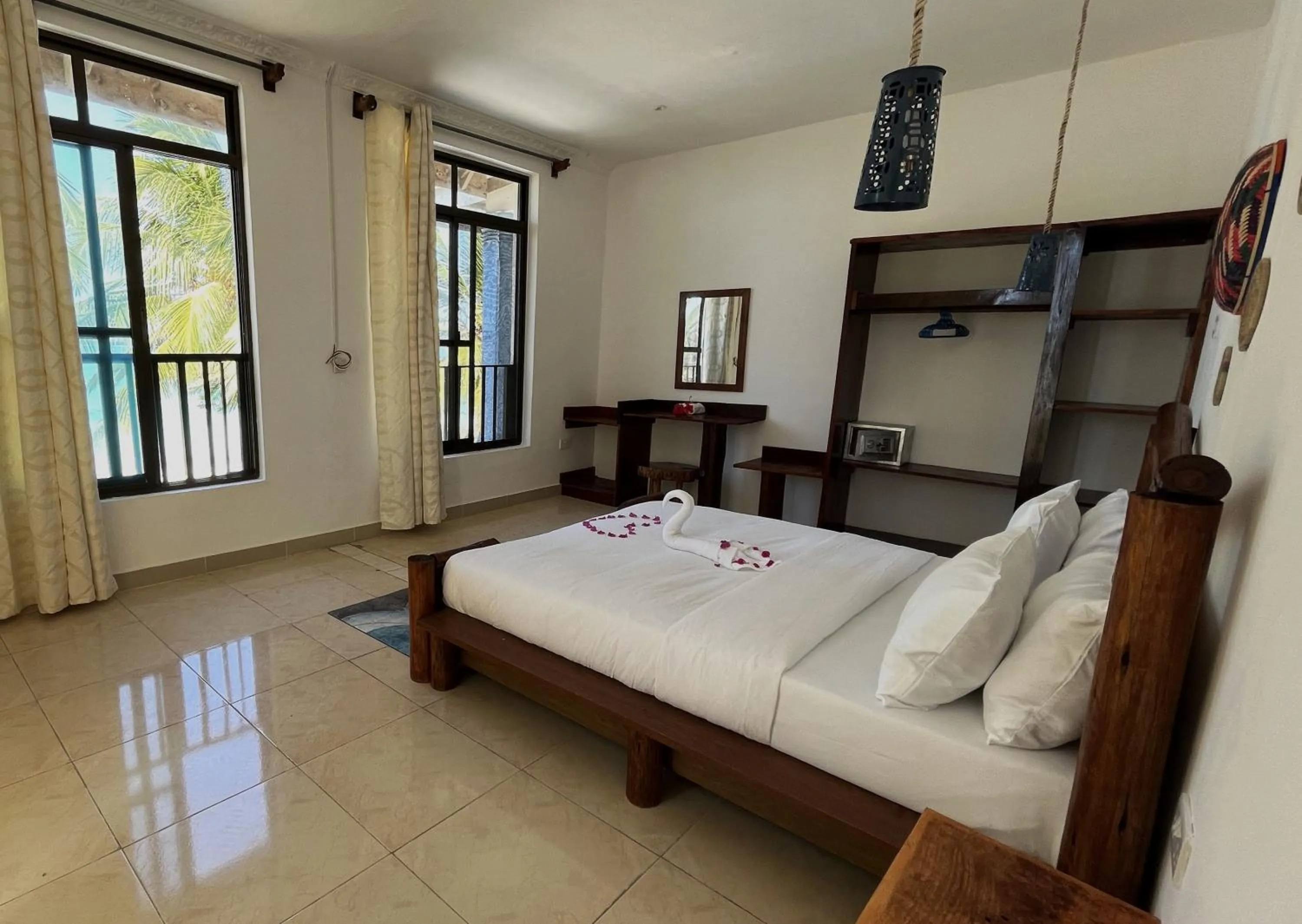 Bed in BIANCO AZZURRO Hotel & Restaurant