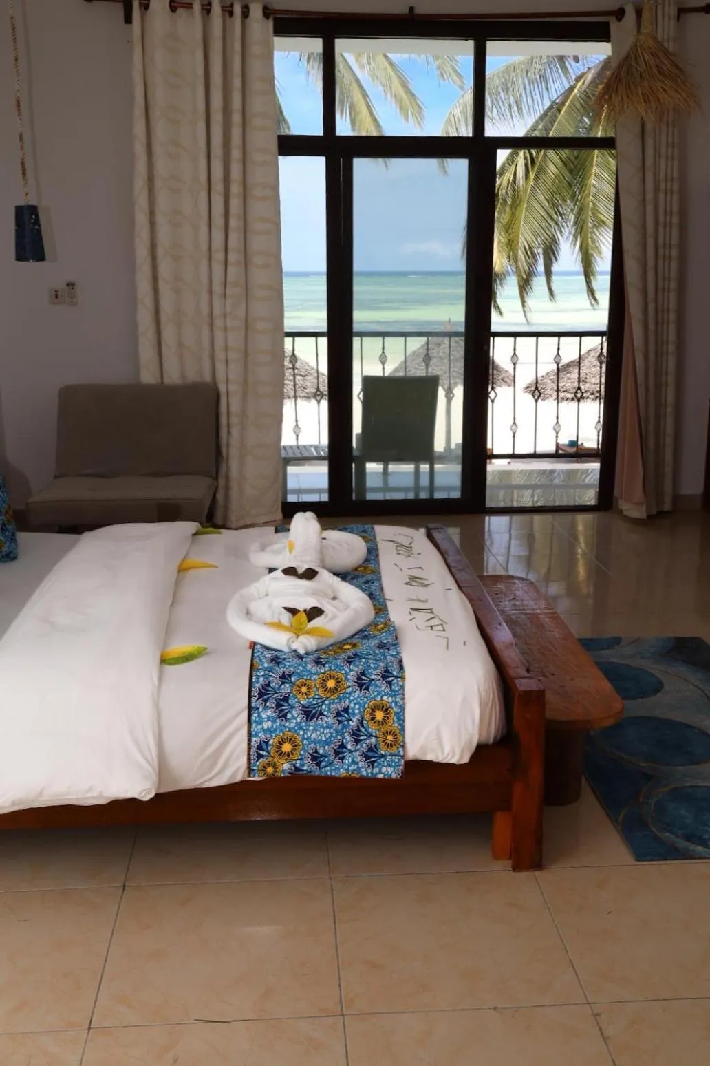 Bed in BIANCO AZZURRO Hotel & Restaurant