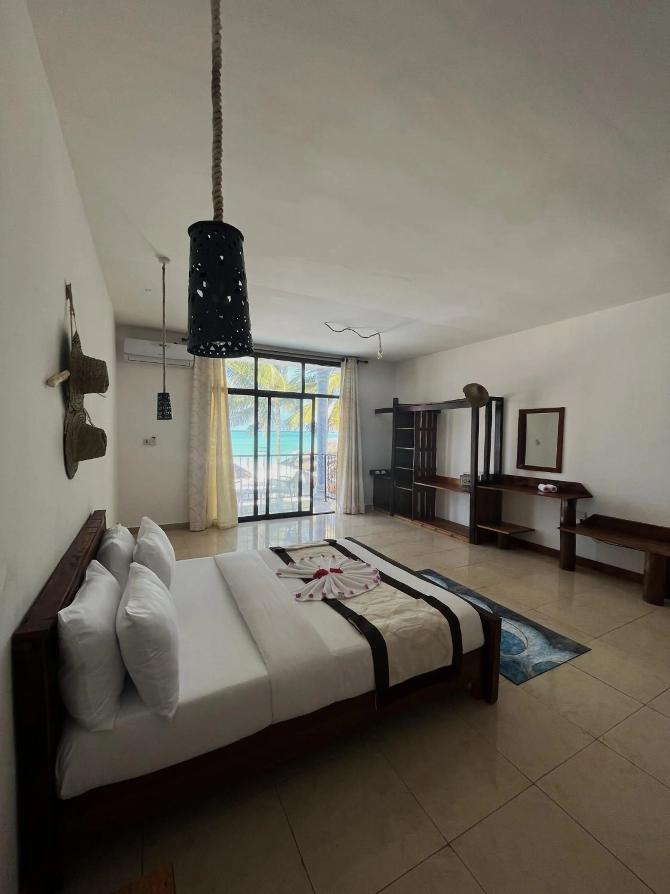 Bed in BIANCO AZZURRO Hotel & Restaurant