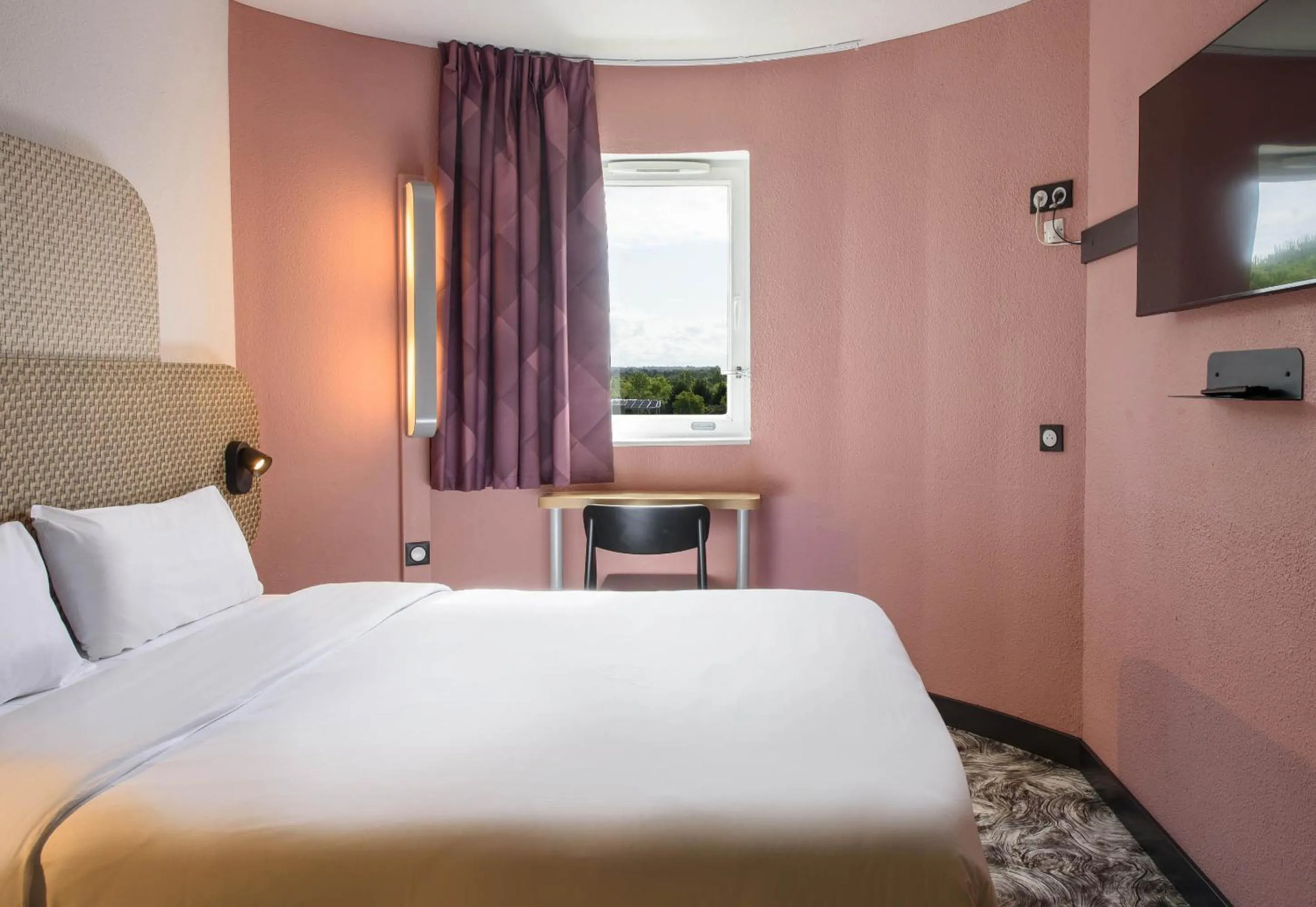 Bed in B&B HOTEL Toulouse Cité de l'Espace Gonord