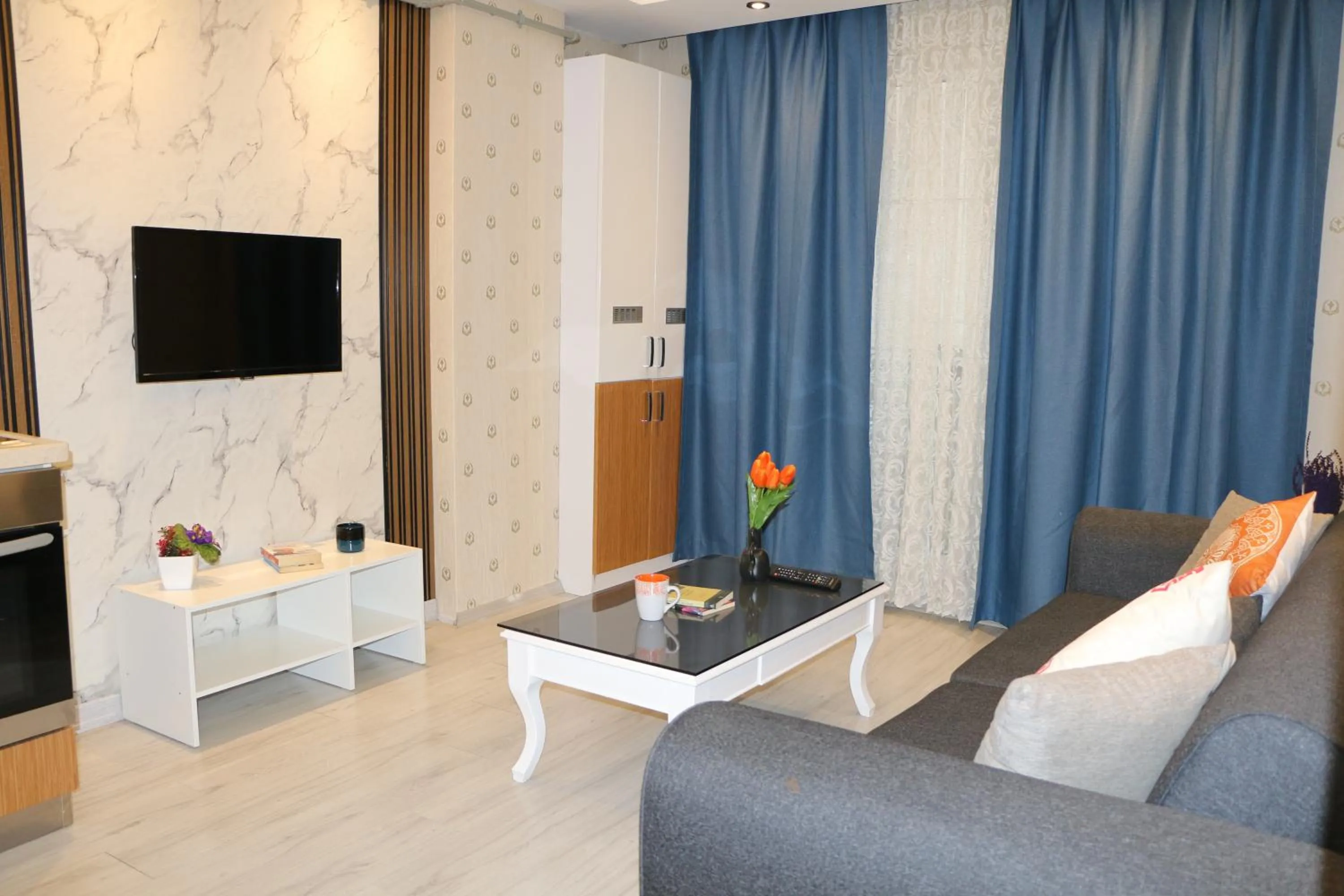 Communal lounge/ TV room in THE MOST HOTEL