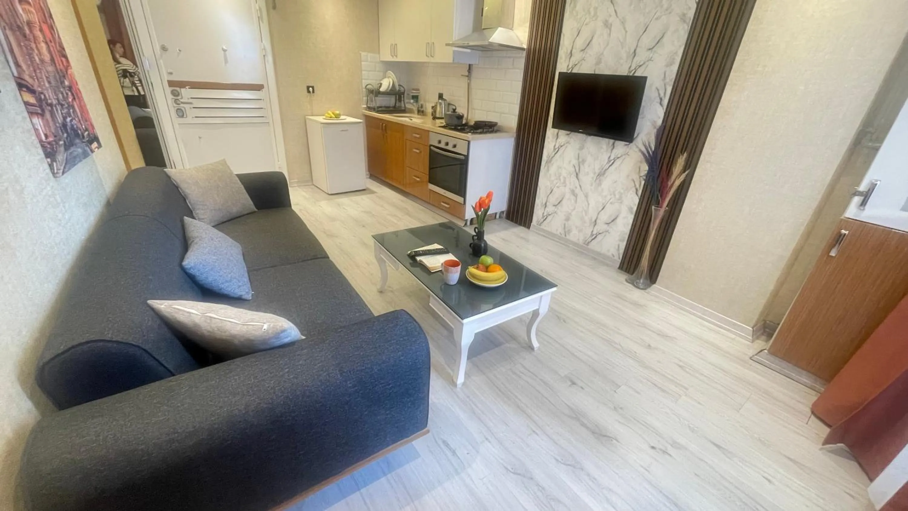 Communal lounge/ TV room in THE MOST HOTEL