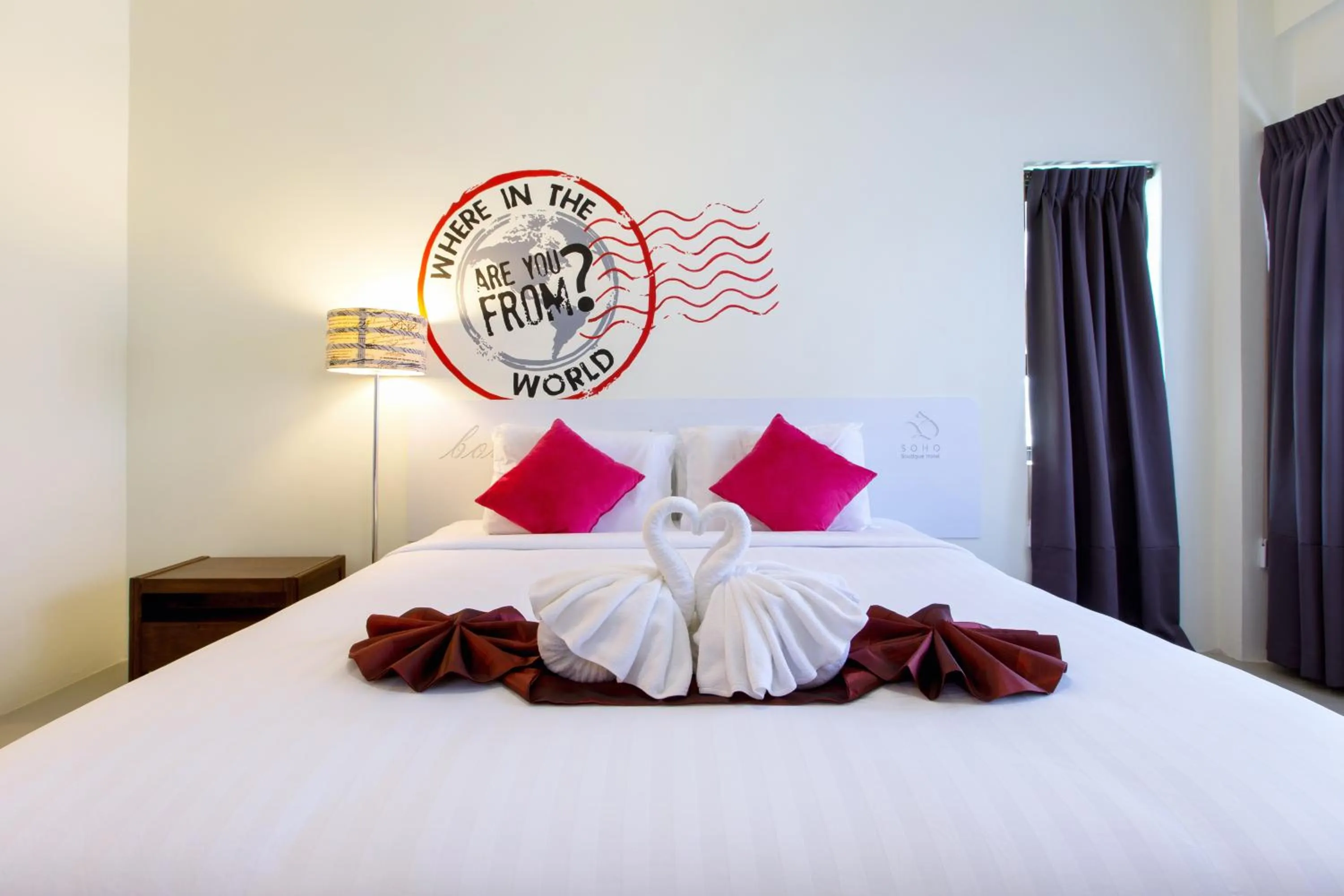 Bed in SOHO Boutique Hotel