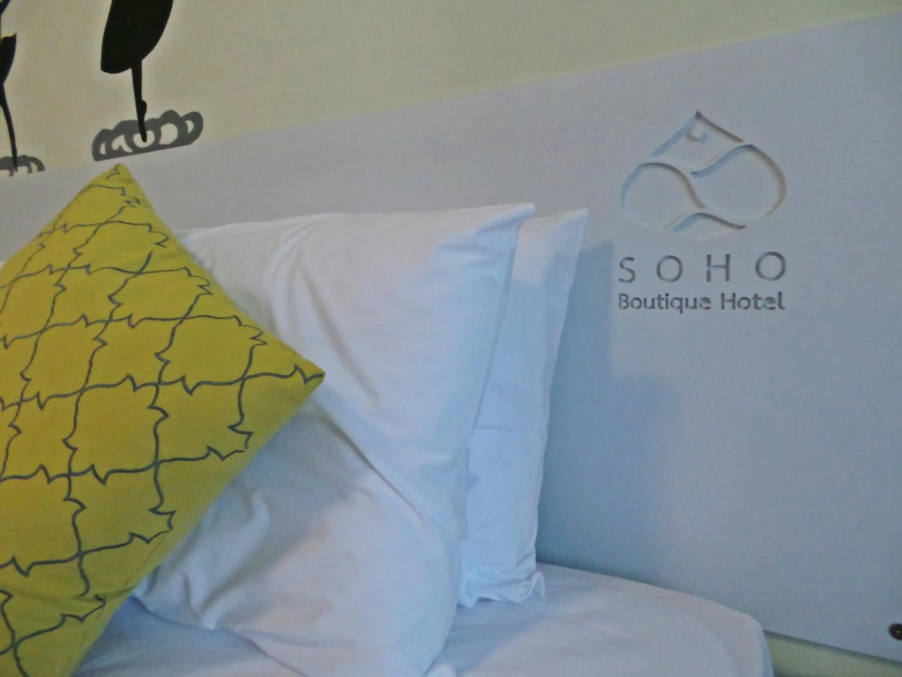 Photo of the whole room, Bed in SOHO Boutique Hotel