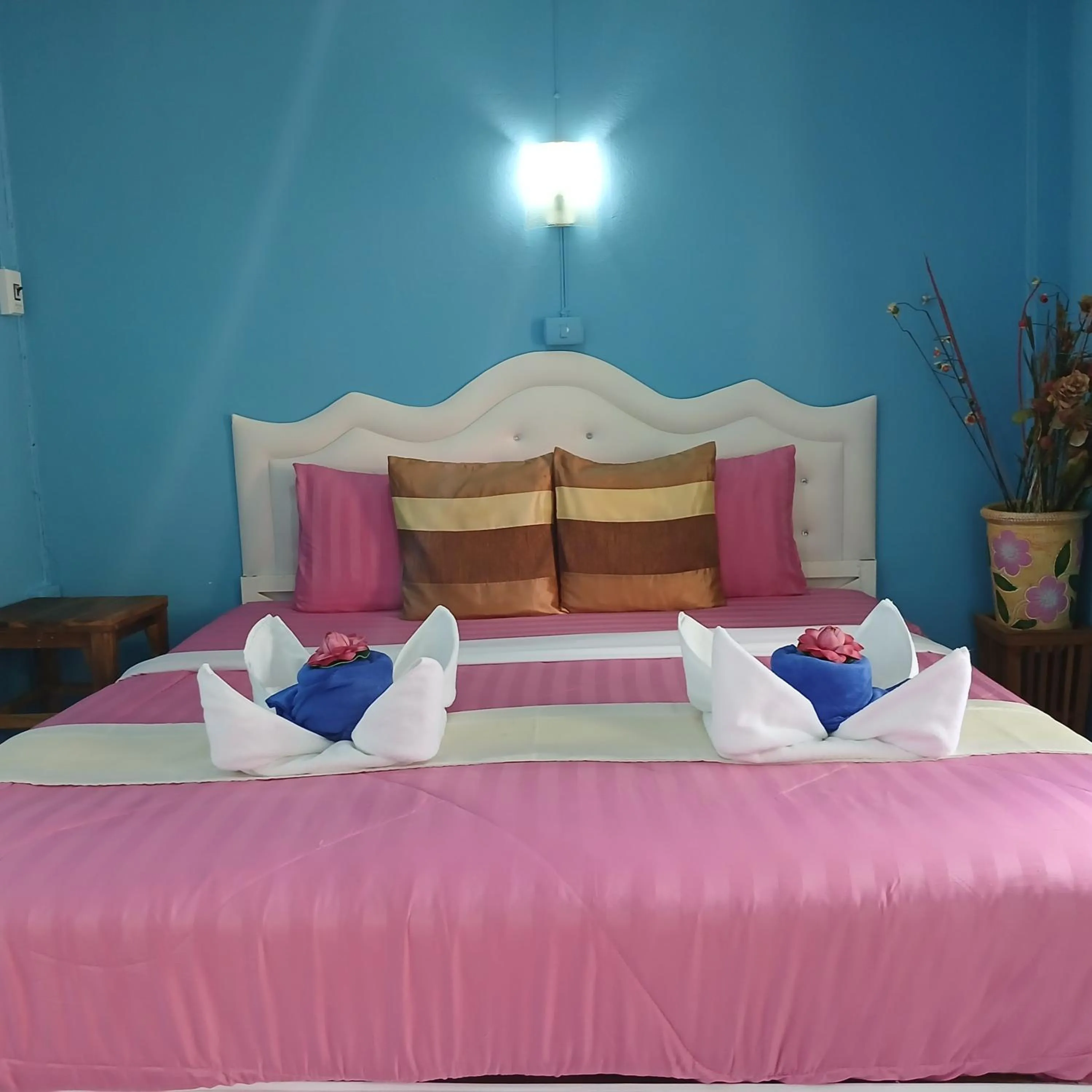 Bed in Thai Garden​ Resort​ Kanchanaburi​
