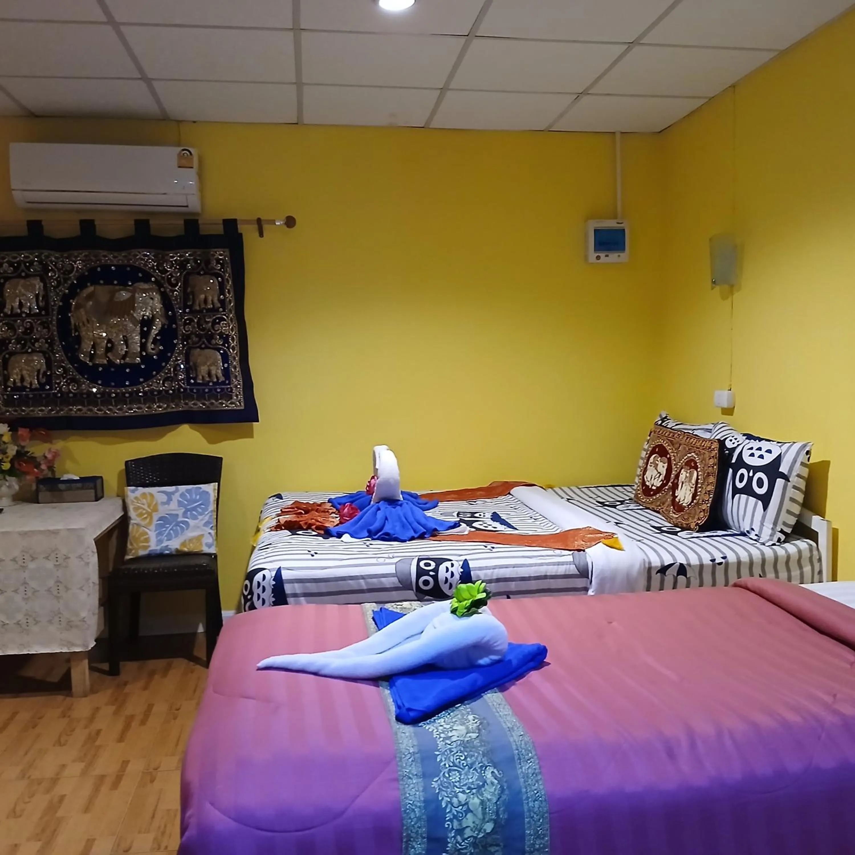 Bed in Thai Garden​ Resort​ Kanchanaburi​