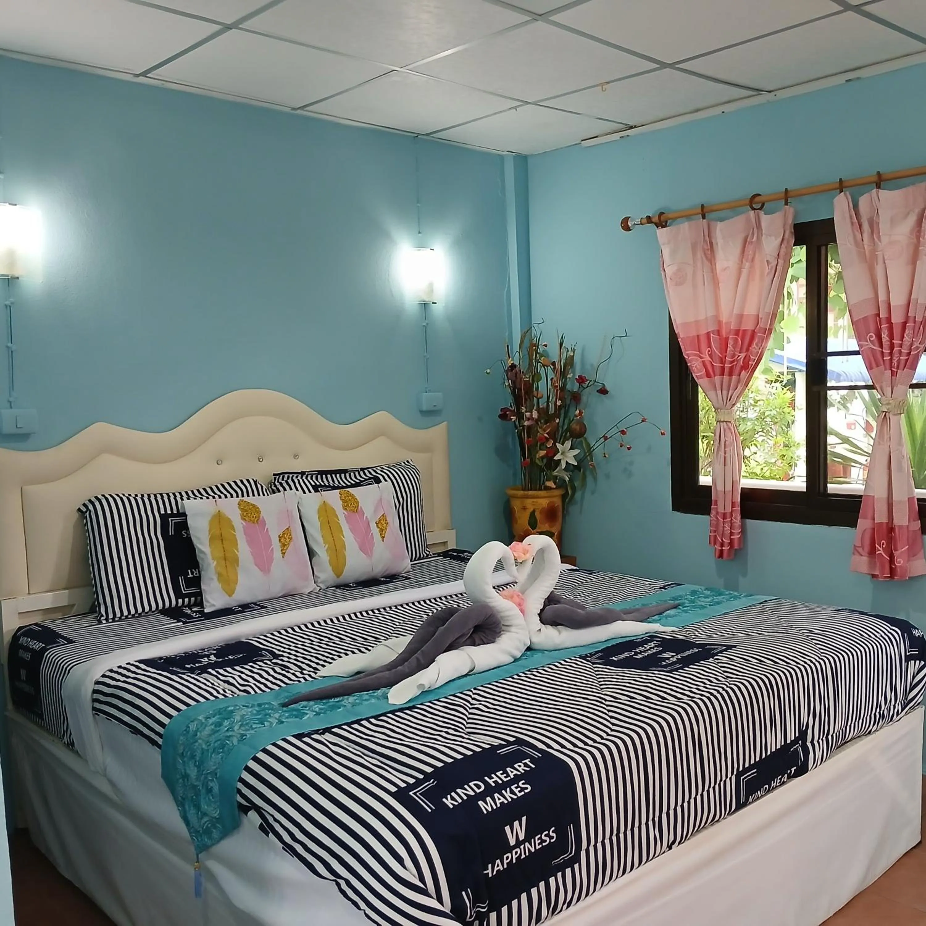 Bed in Thai Garden​ Resort​ Kanchanaburi​