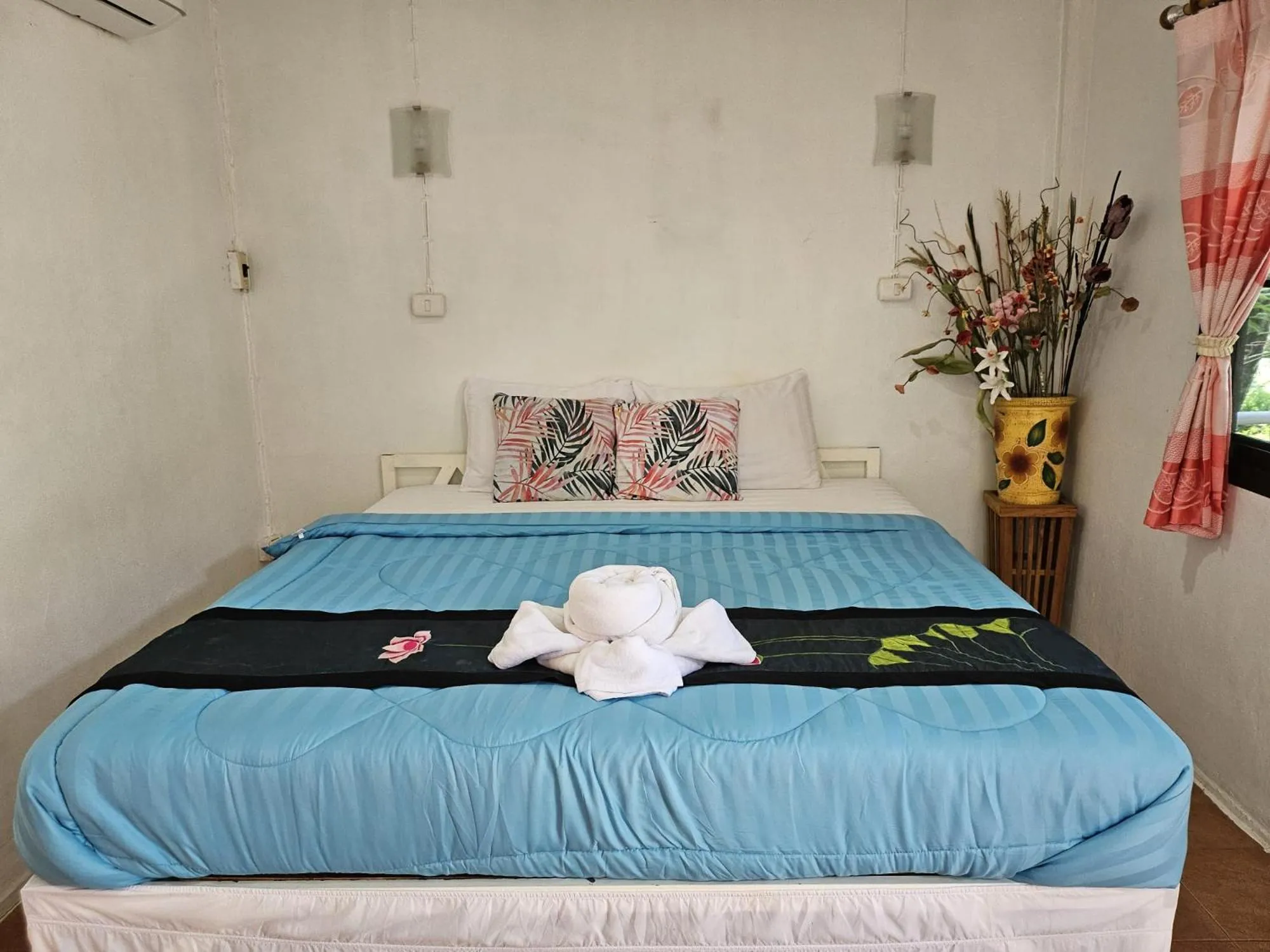 Bed in Thai Garden​ Resort​ Kanchanaburi​