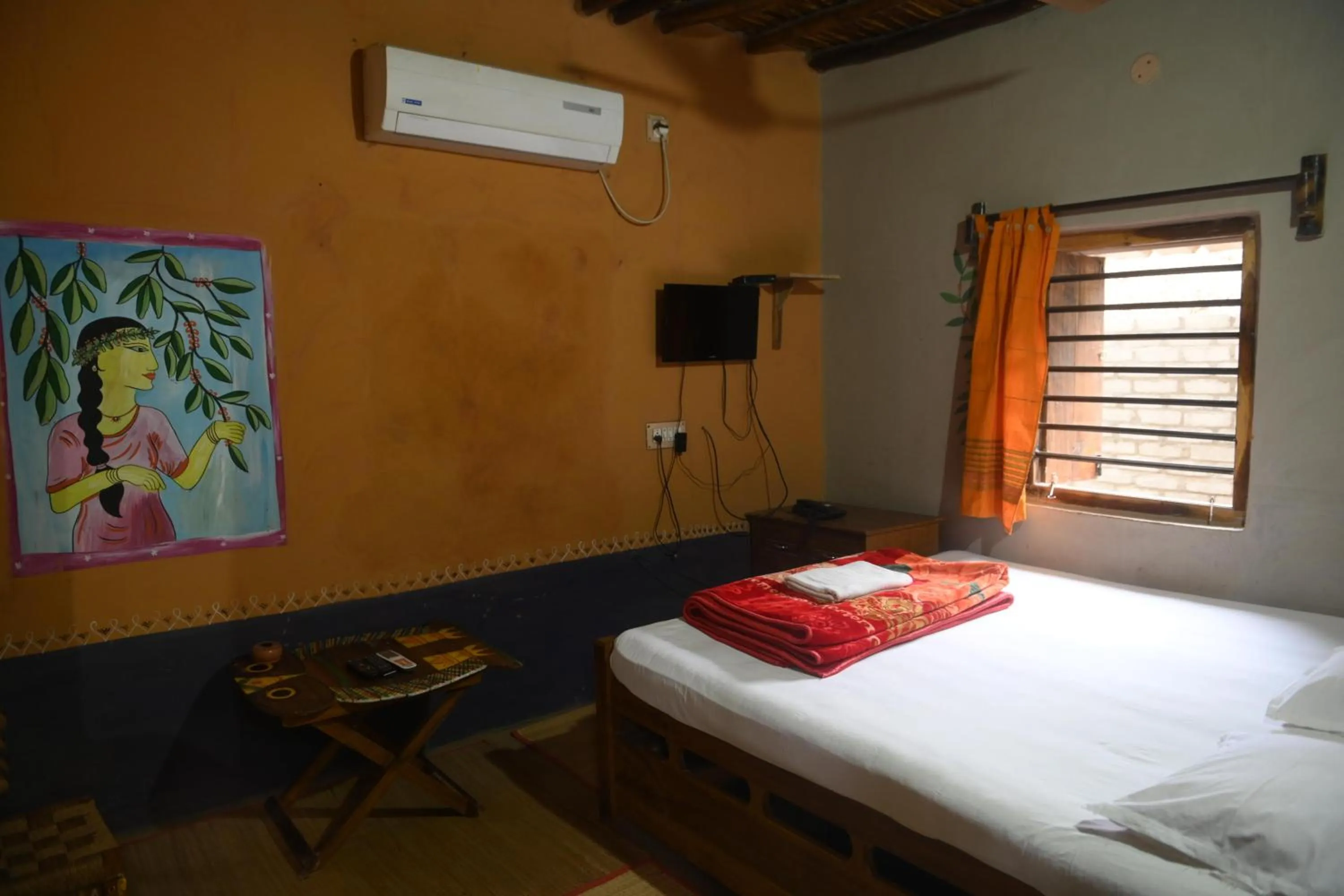 Bed in Ram Shyam Village Resort
