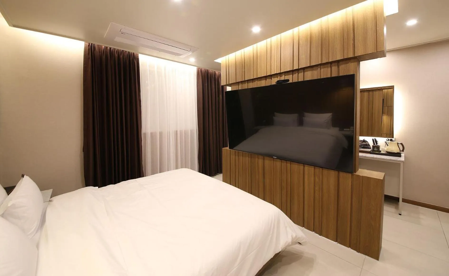 Bed in Brown Dot Hotel Sinan