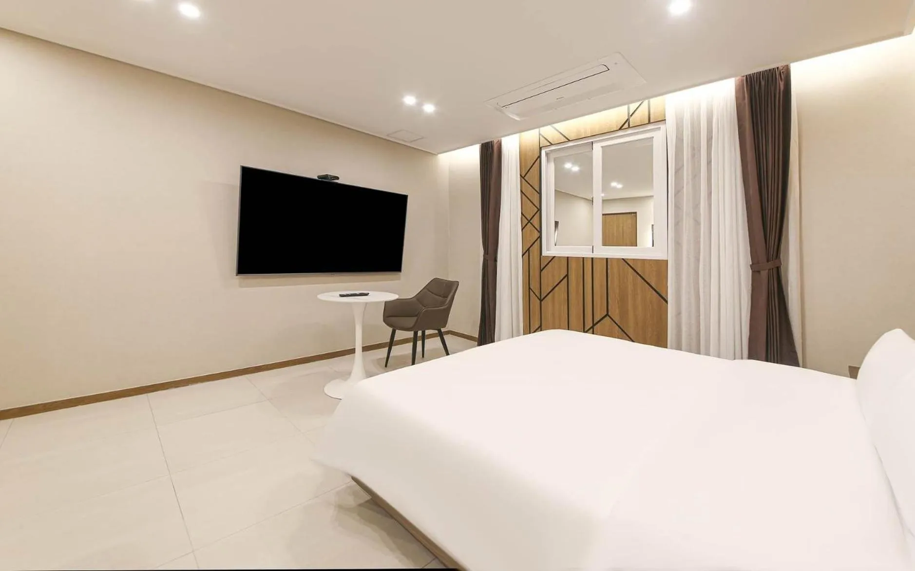 Bed in Brown Dot Hotel Sinan