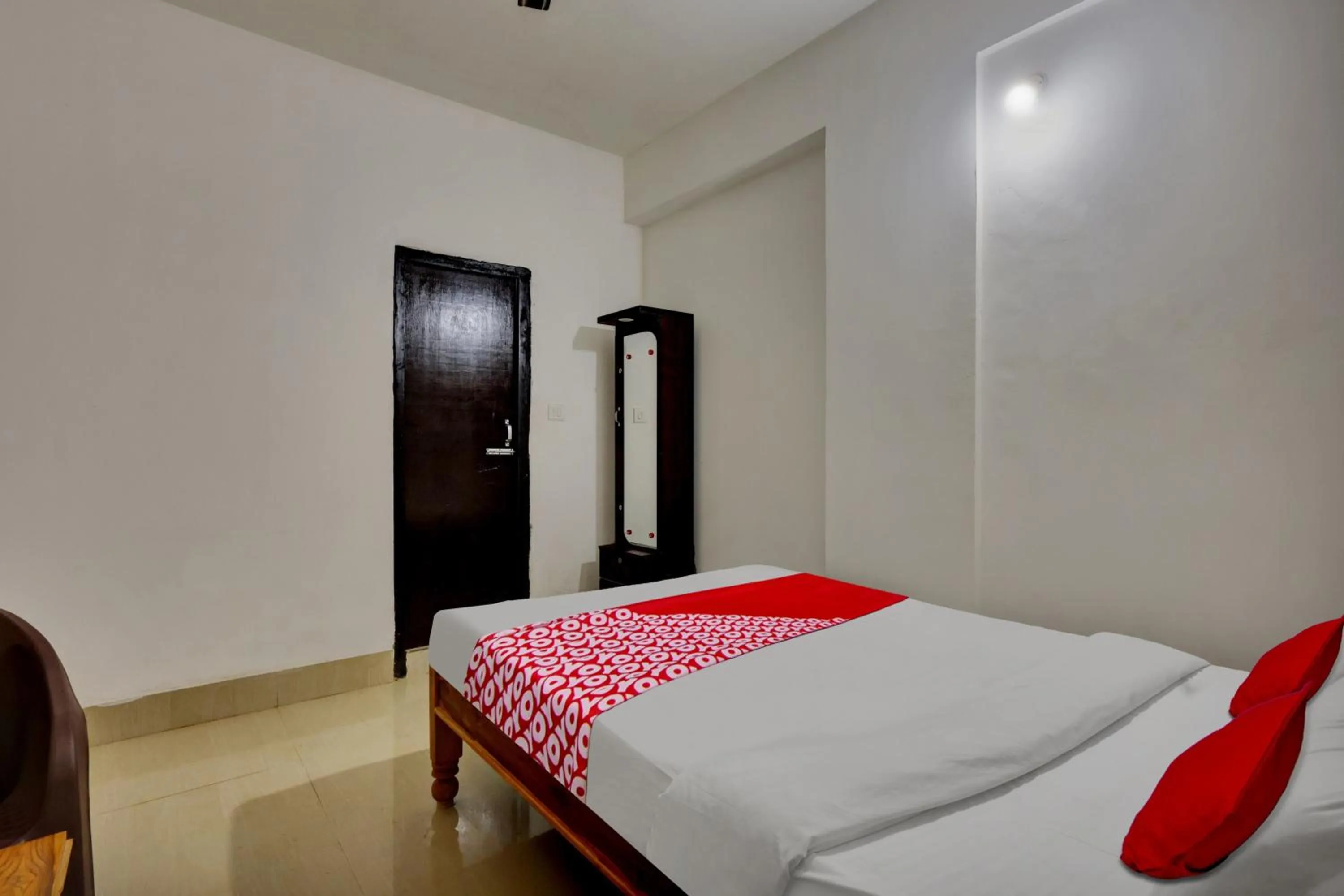 Bedroom in OYO Flagship Larica Green Valley