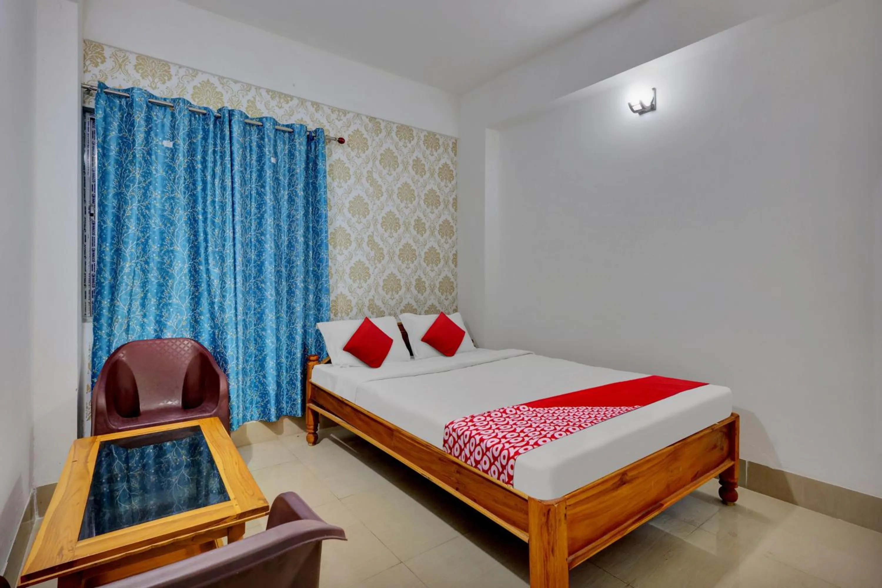 Bedroom in OYO Flagship Larica Green Valley