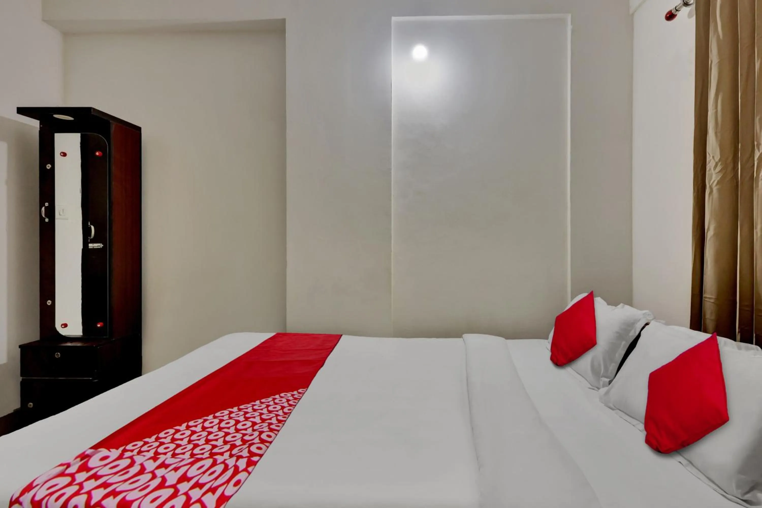 Bedroom in OYO Flagship Larica Green Valley
