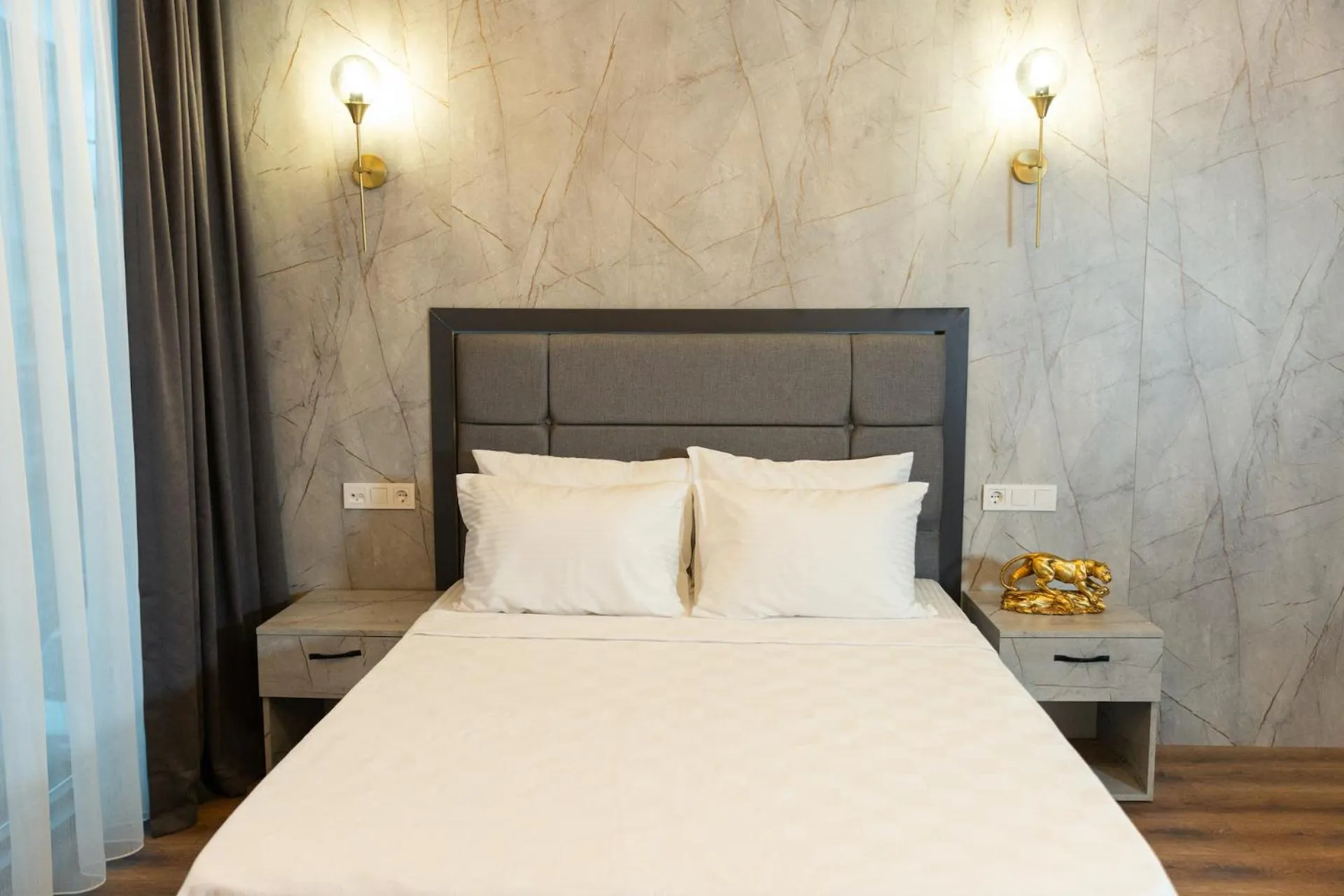 Bed in The Hera Business Hotels & Spa