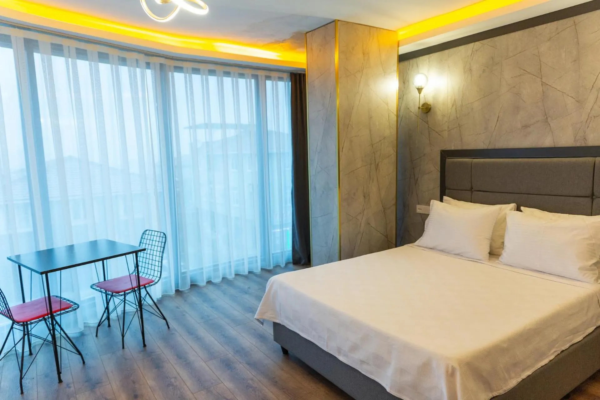 Bed in The Hera Business Hotels & Spa