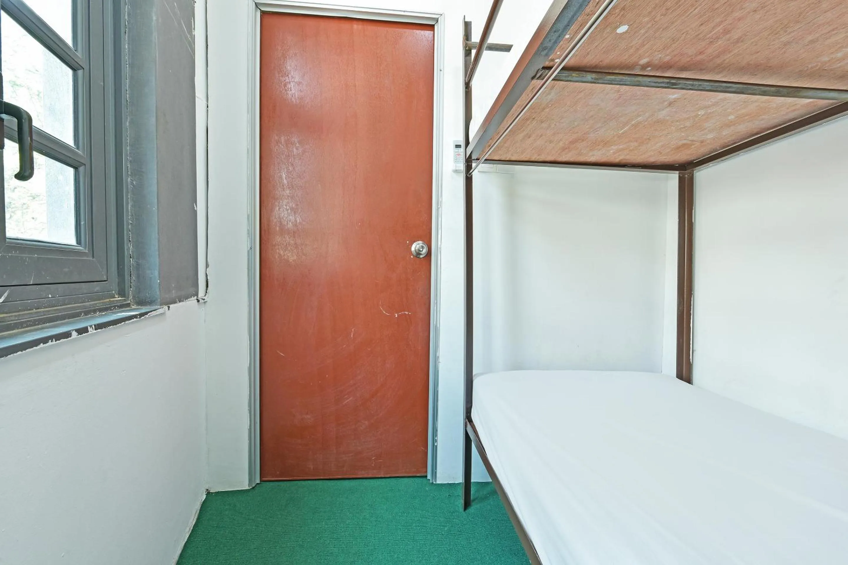 Bedroom in SPOT ON 90850 Ehsan Travels Home