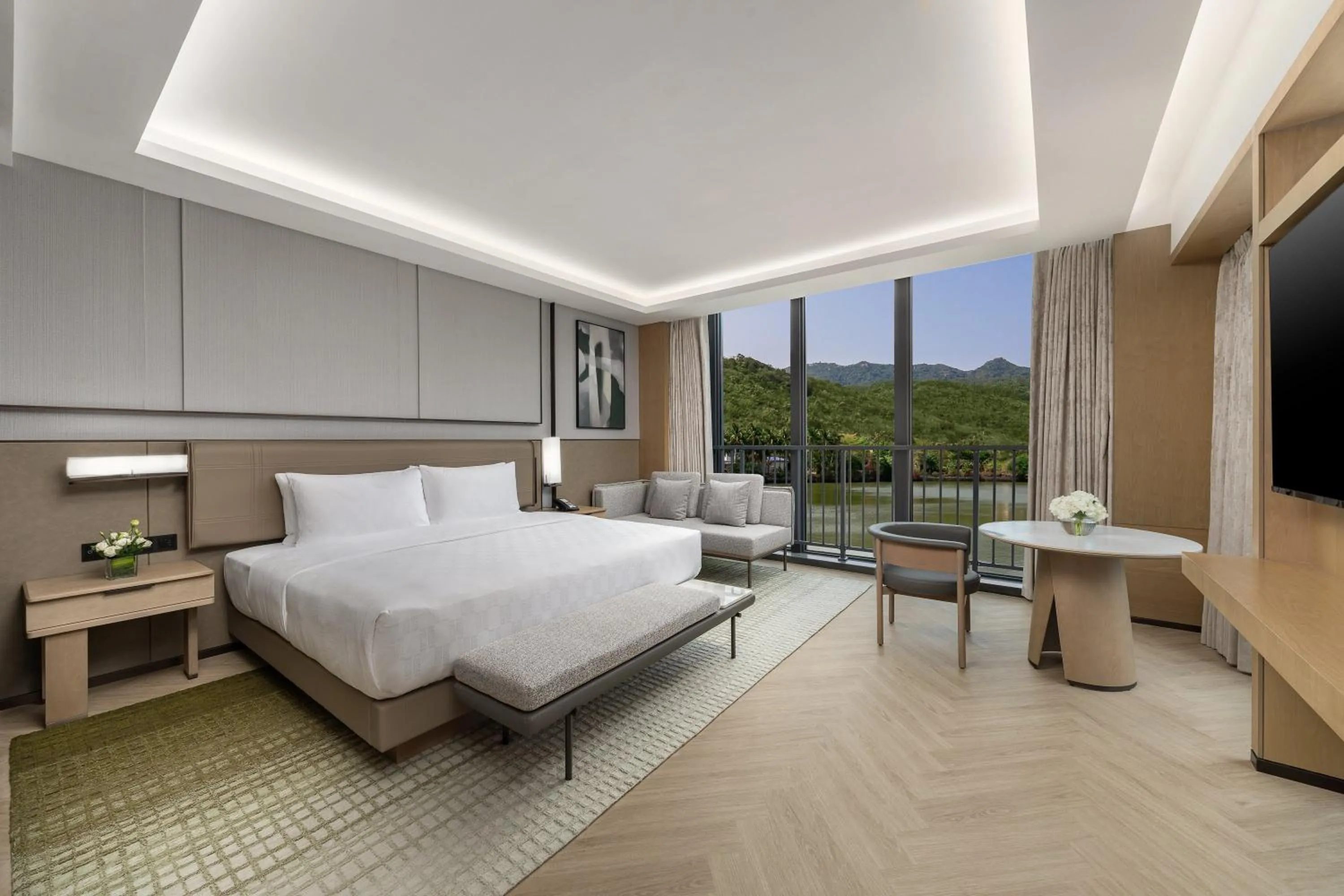 Photo of the whole room, Bed in HUALUXE Sanya Yalong Bay Resort