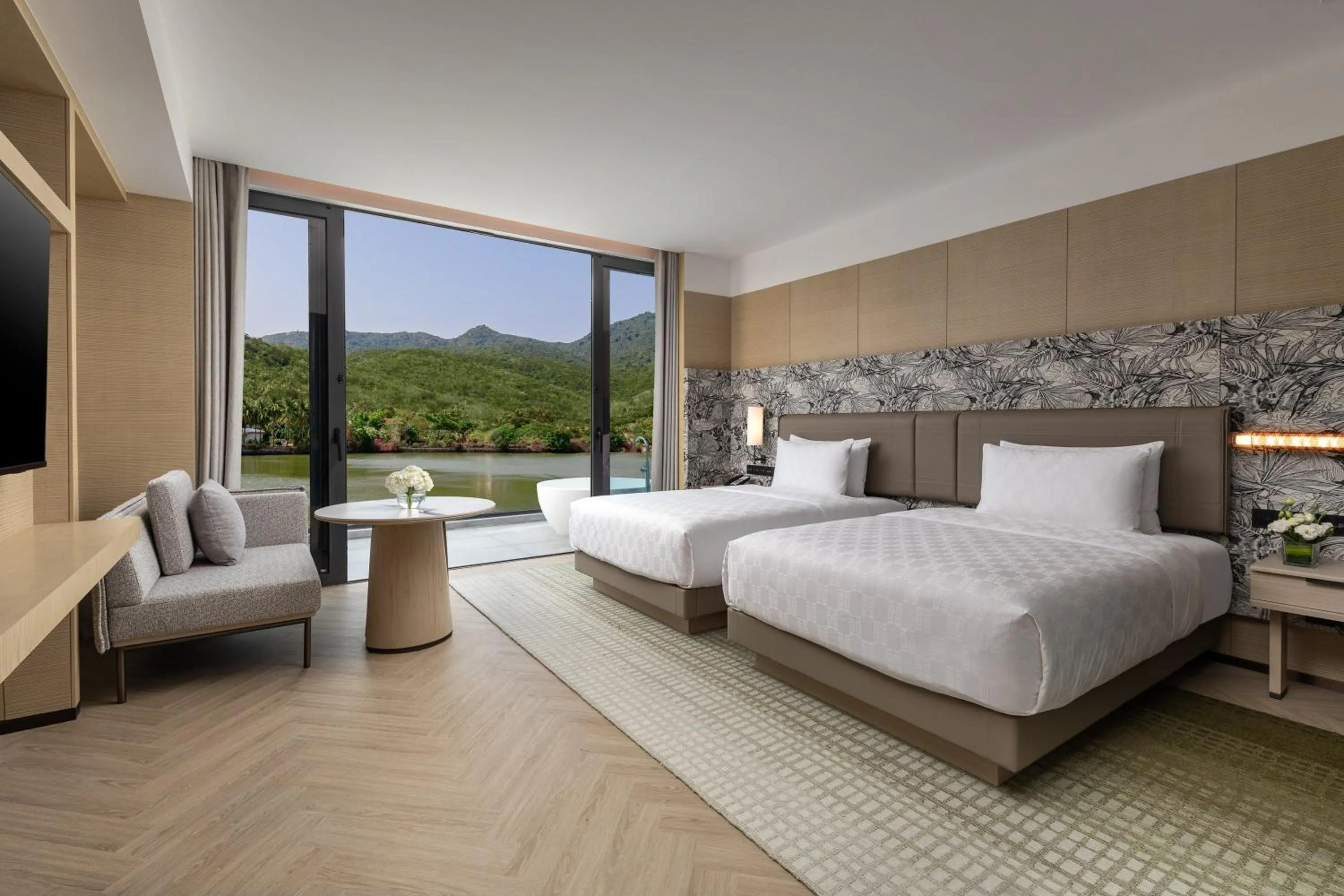 Photo of the whole room, Bed in HUALUXE Sanya Yalong Bay Resort