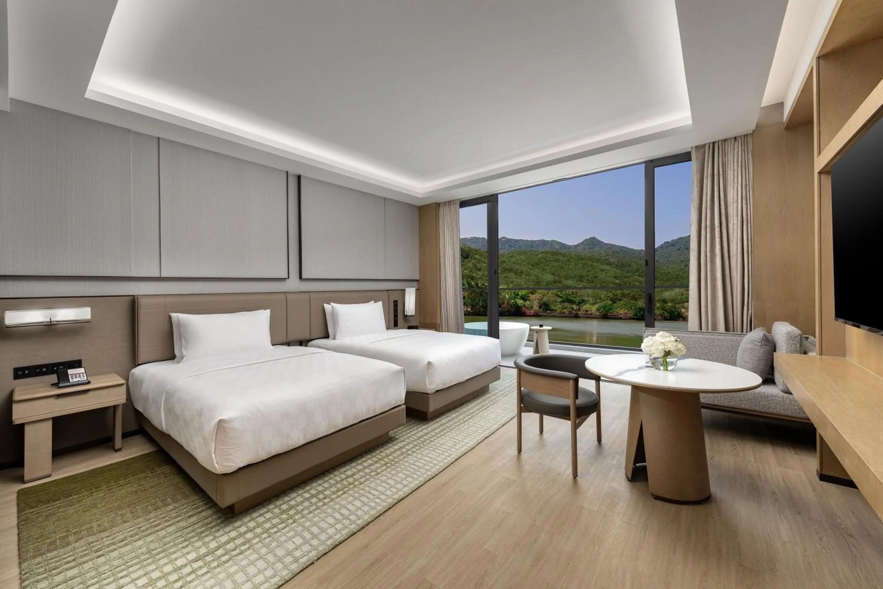 Photo of the whole room, Bed in HUALUXE Sanya Yalong Bay Resort