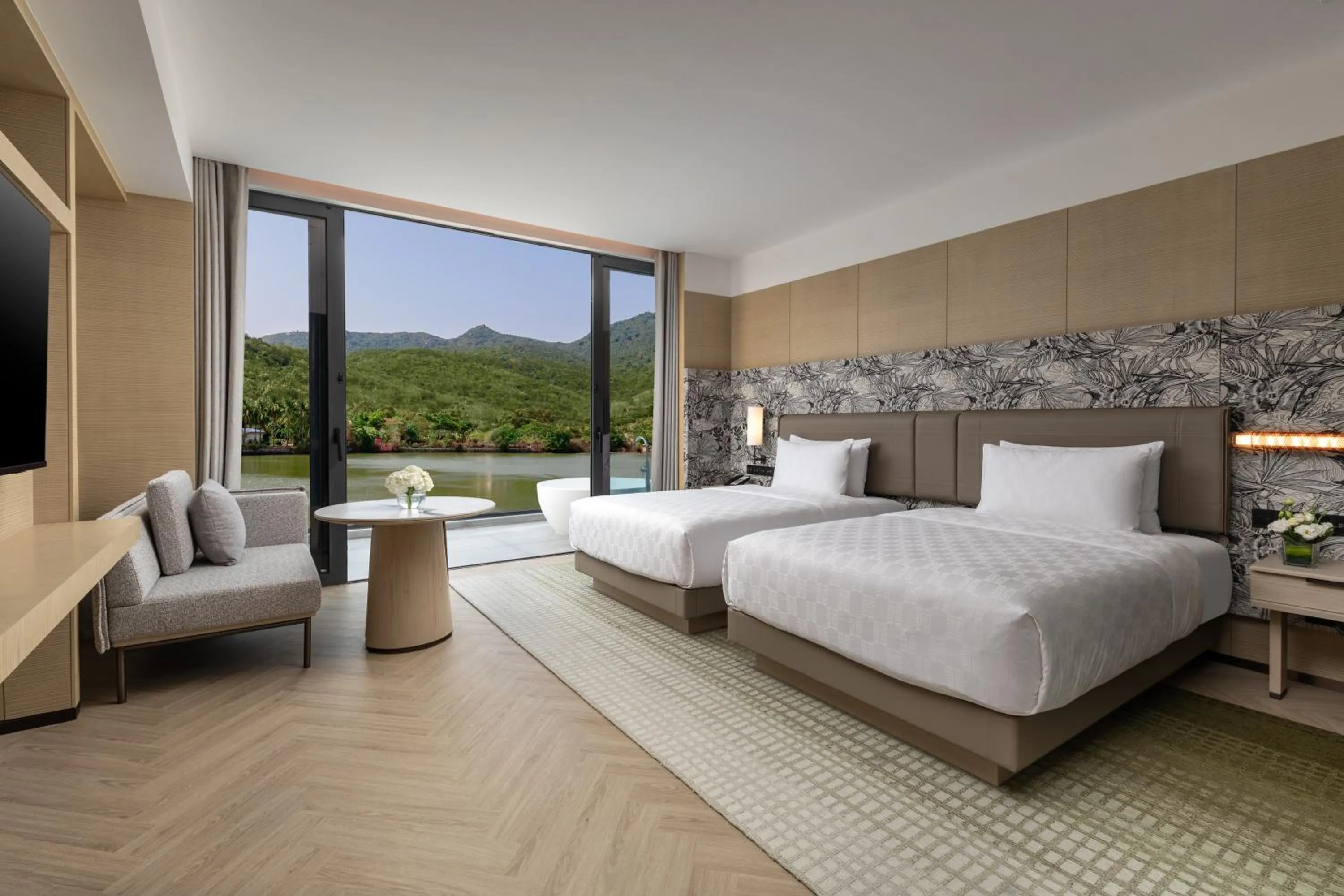 Photo of the whole room, Bed in HUALUXE Sanya Yalong Bay Resort