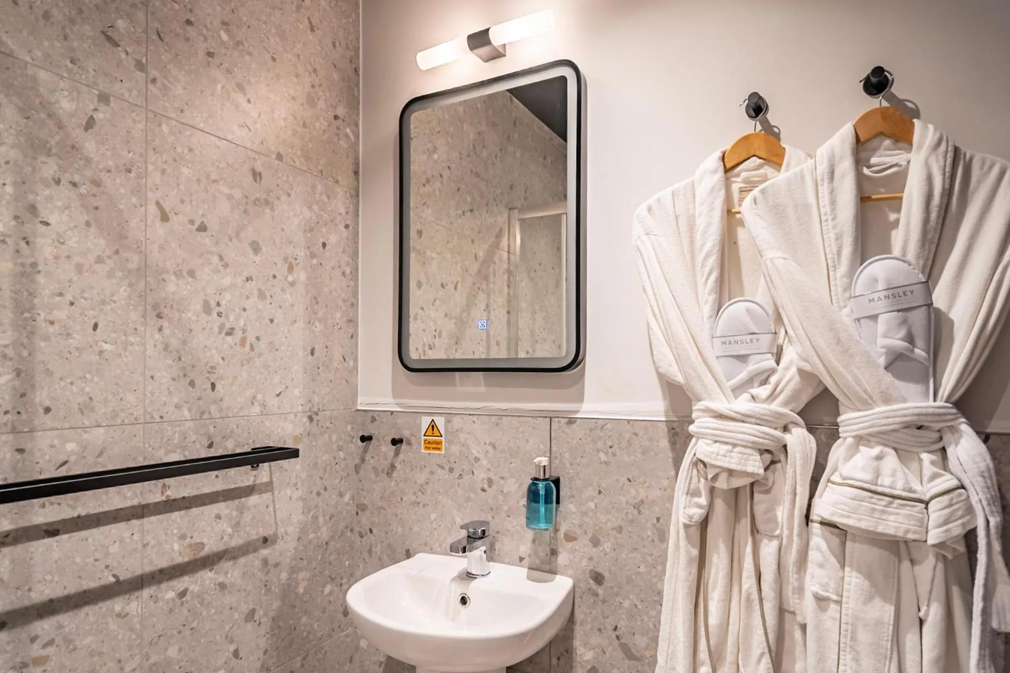 Shower in Crescent Place by Mansley