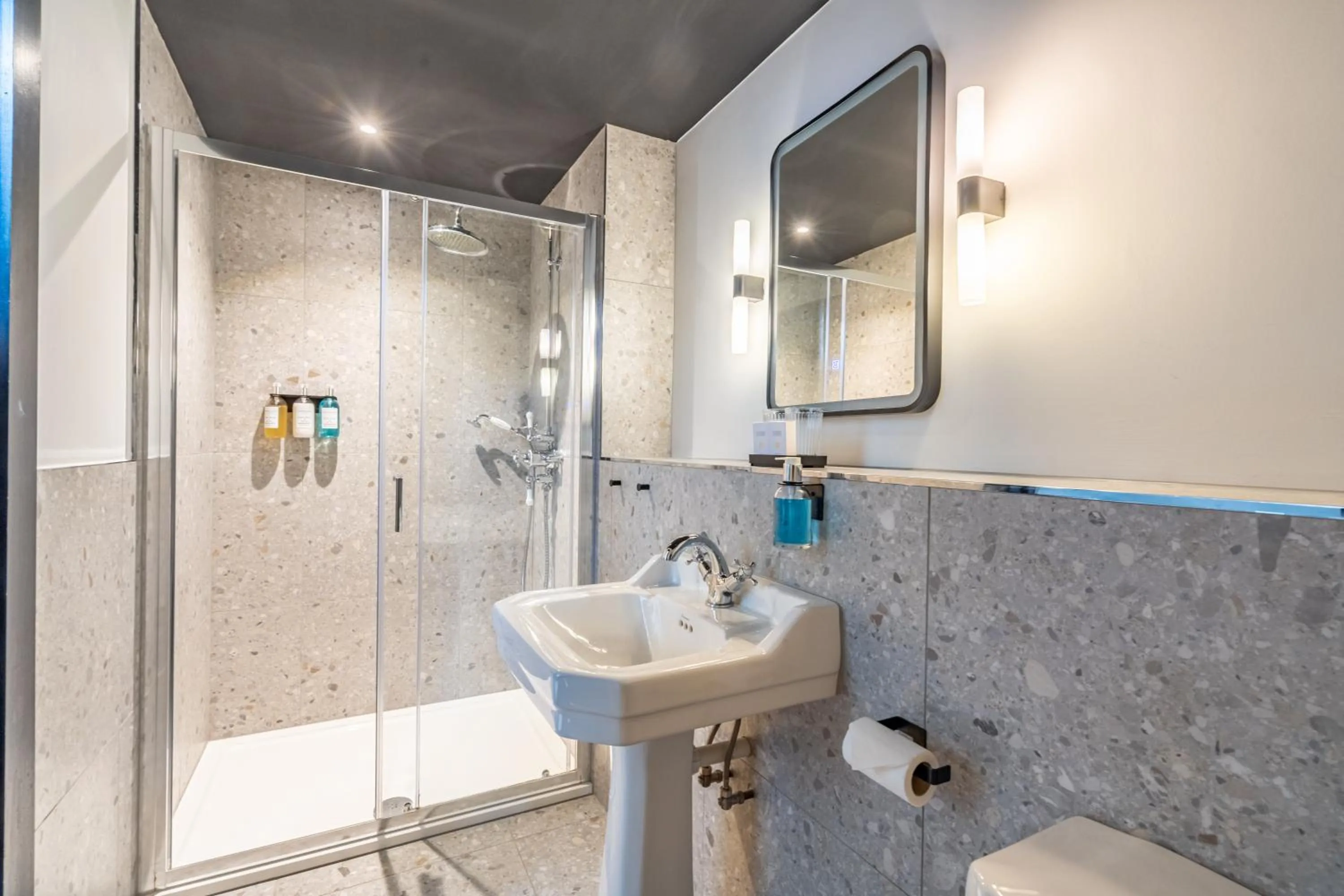 Shower in Crescent Place by Mansley