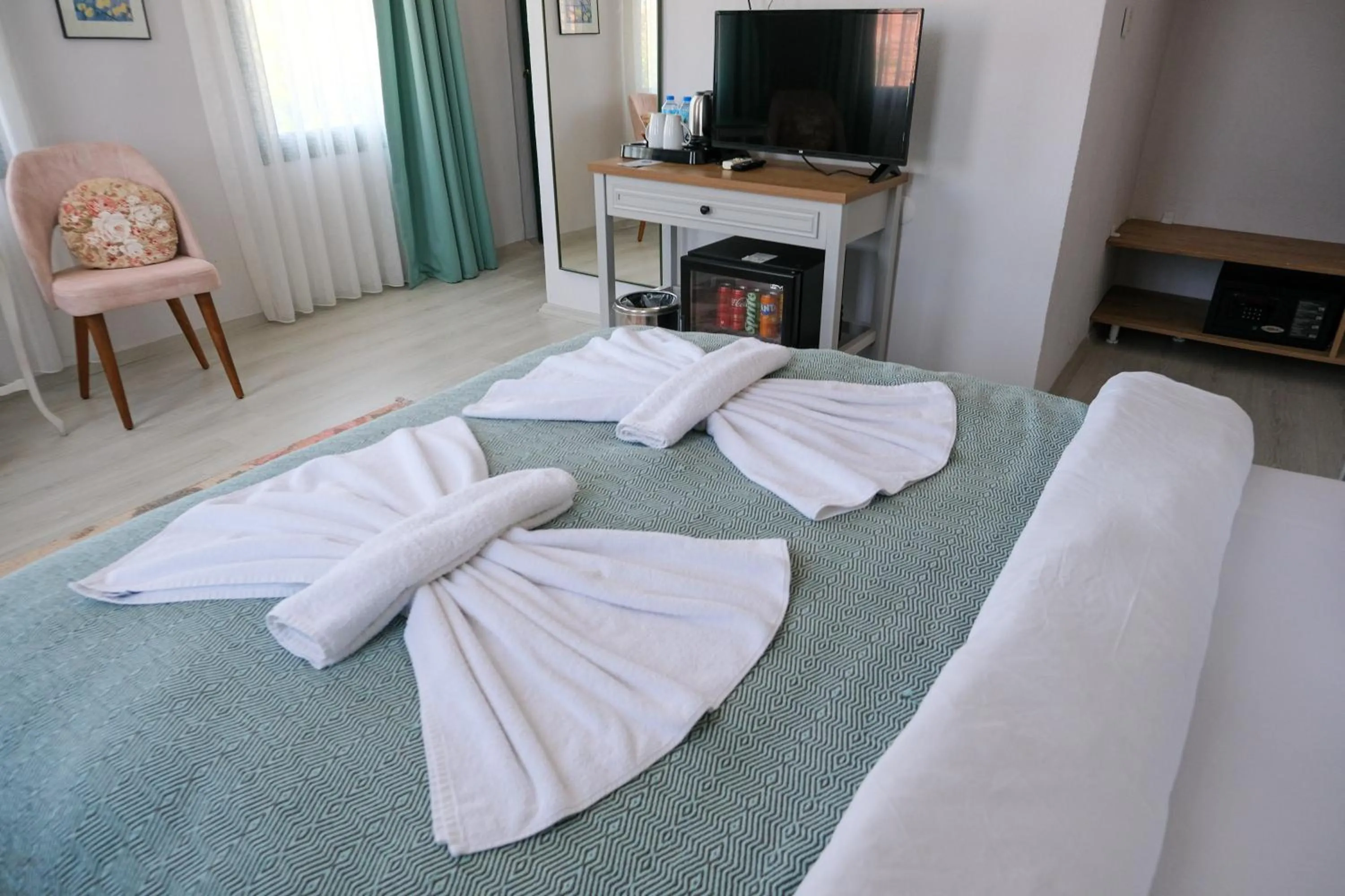 Bed in Garden Palace Boutique Hotel