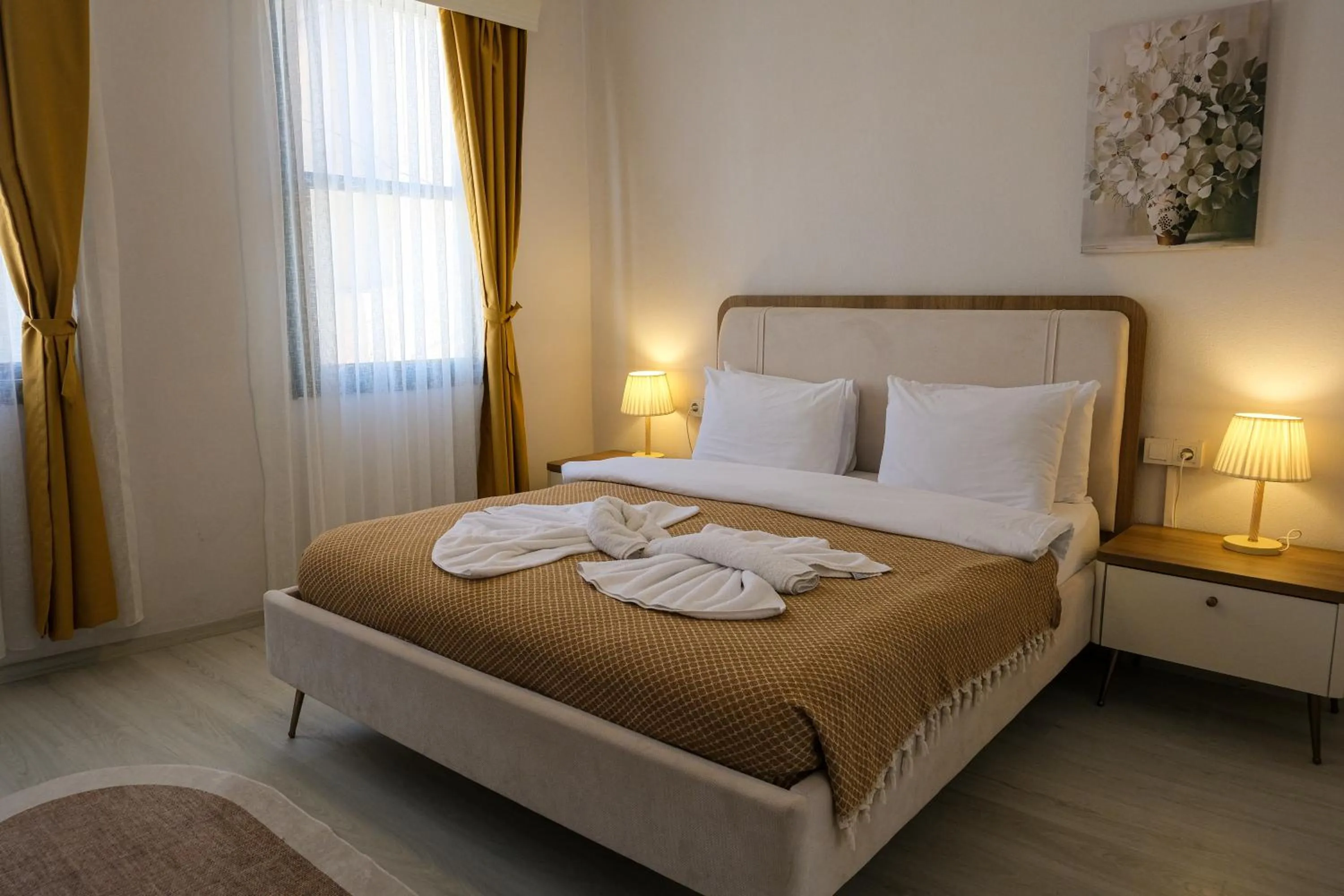 Bed in Garden Palace Boutique Hotel