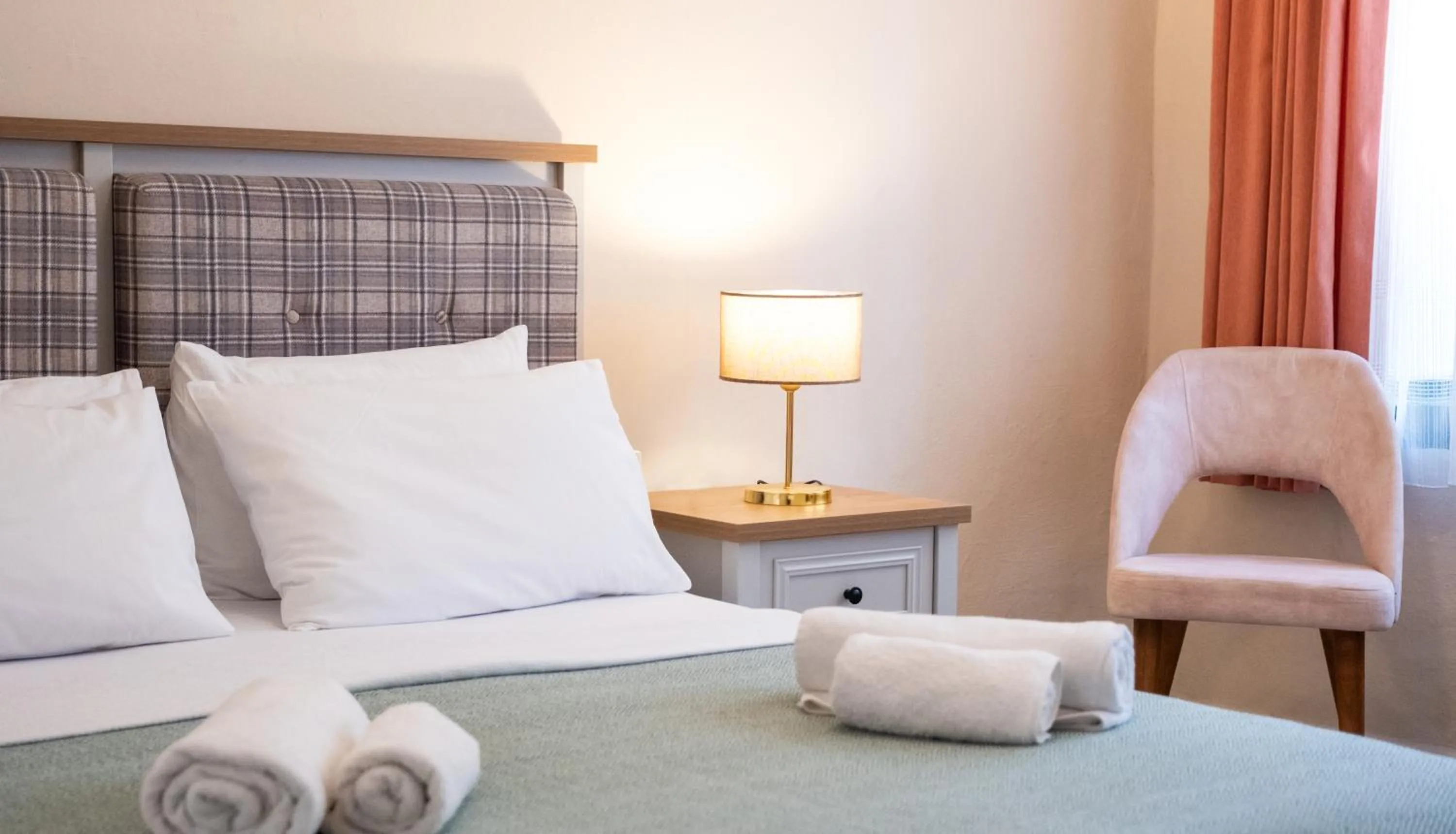 Bed in Garden Palace Boutique Hotel