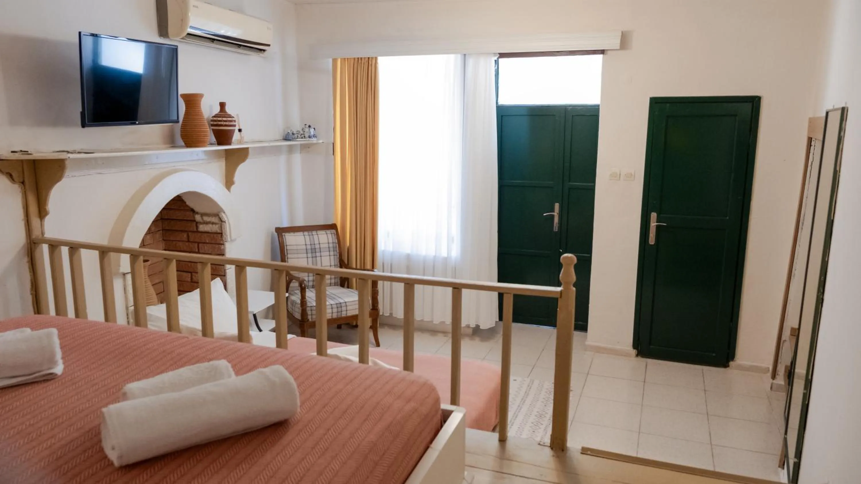 Bed in Garden Palace Boutique Hotel