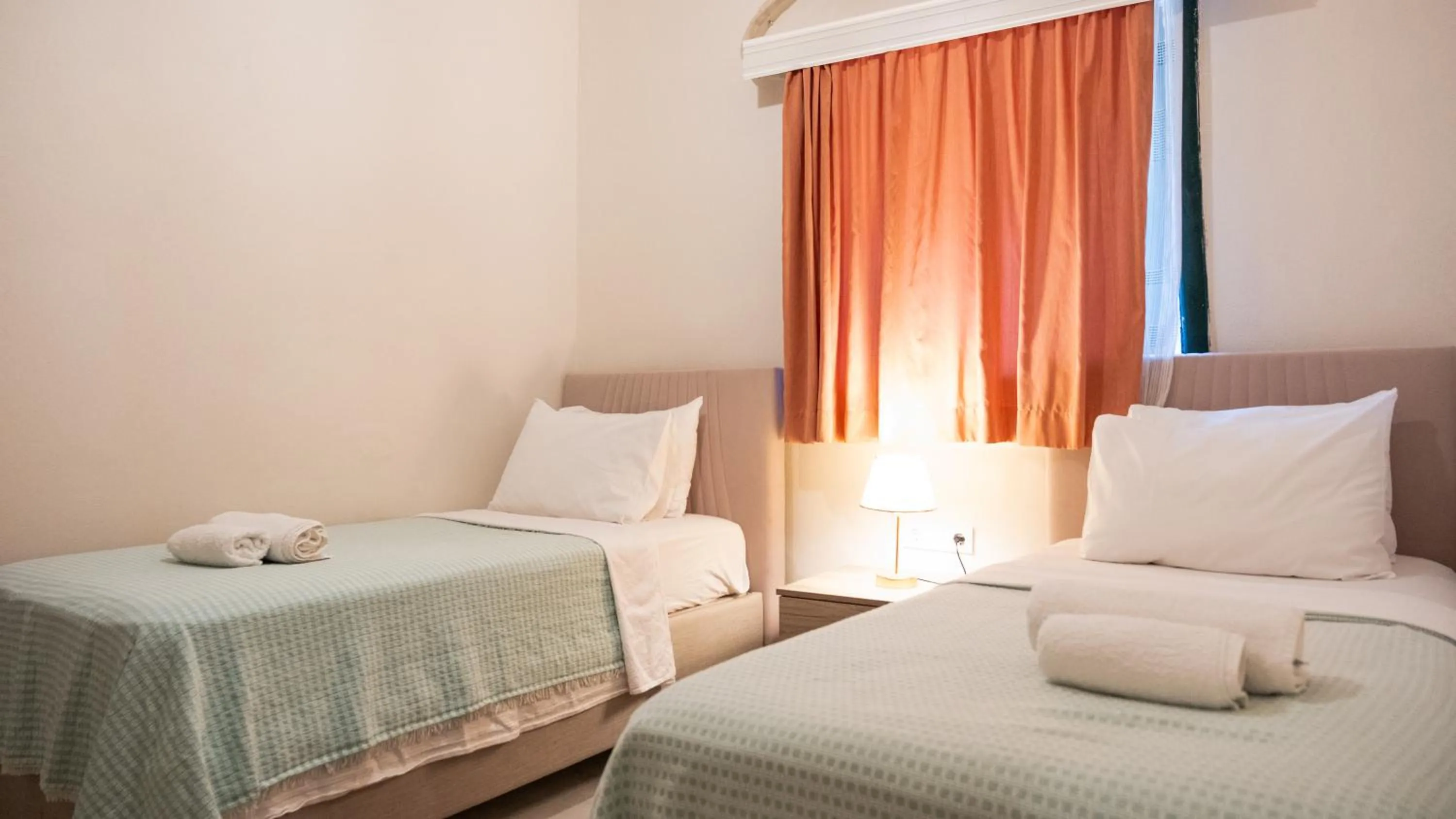 Bed in Garden Palace Boutique Hotel