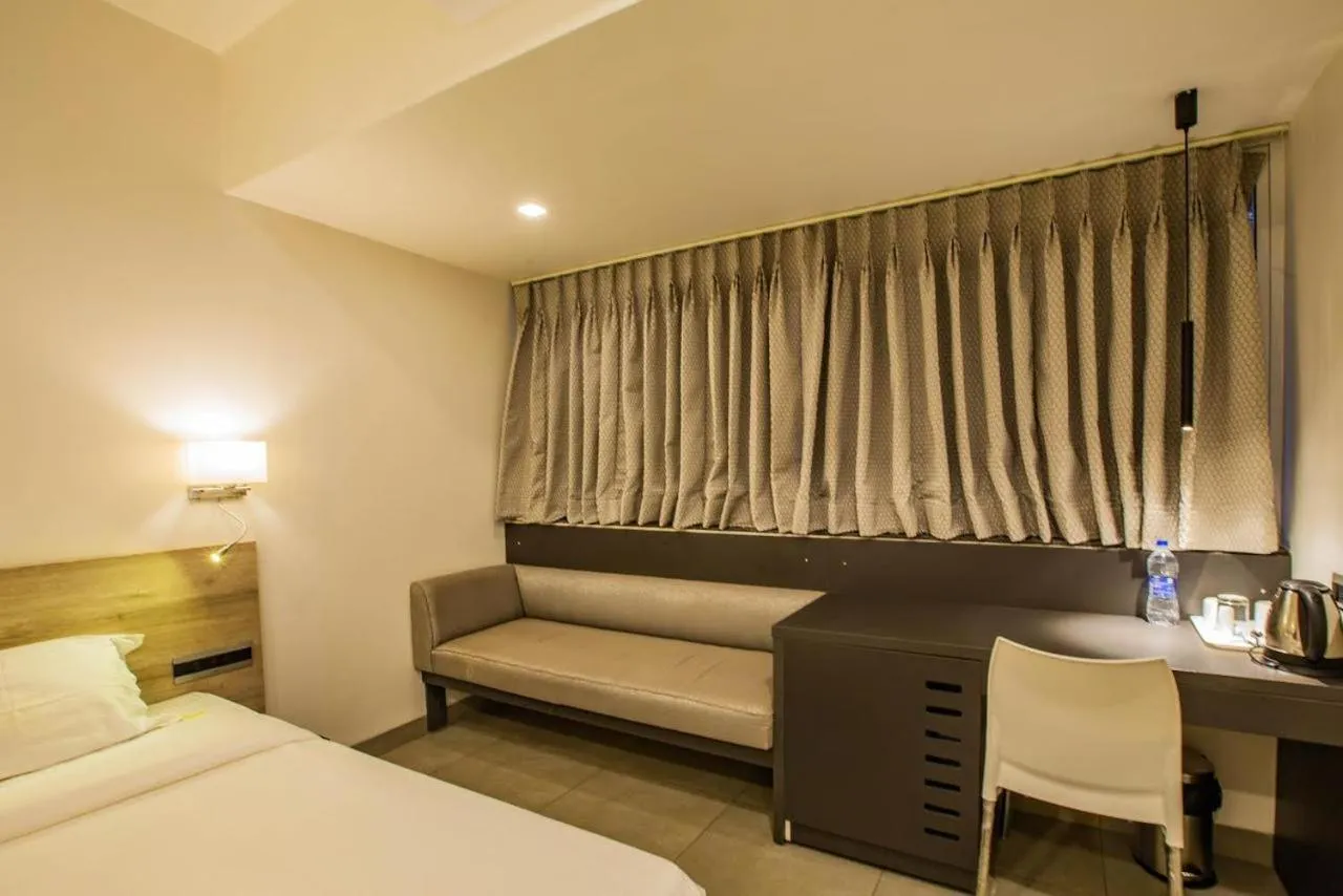 Seating area, Bed in Coastal Pearl Hotel Margao Railway Station