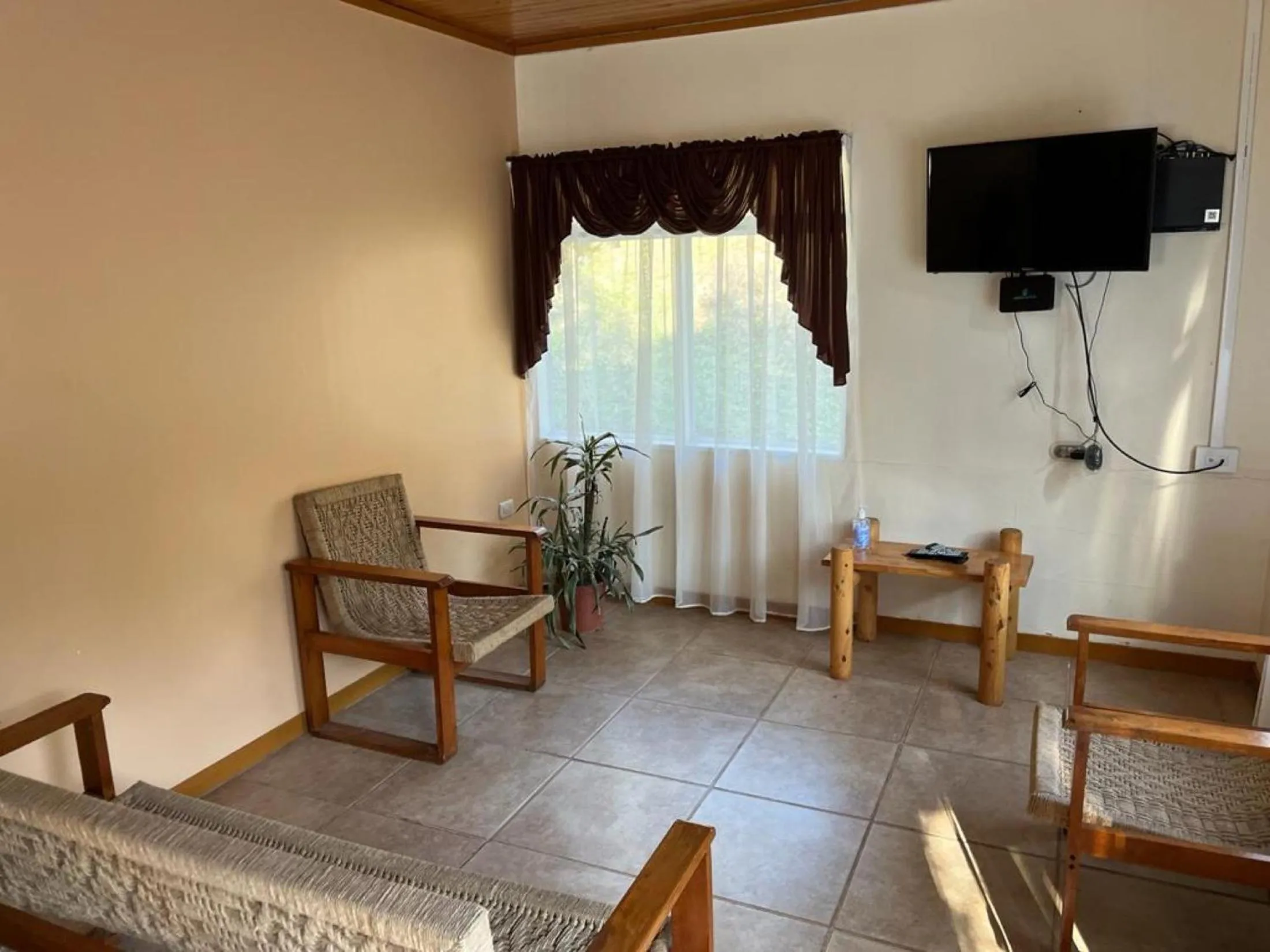 Communal lounge/ TV room in Hacienda La Lucha