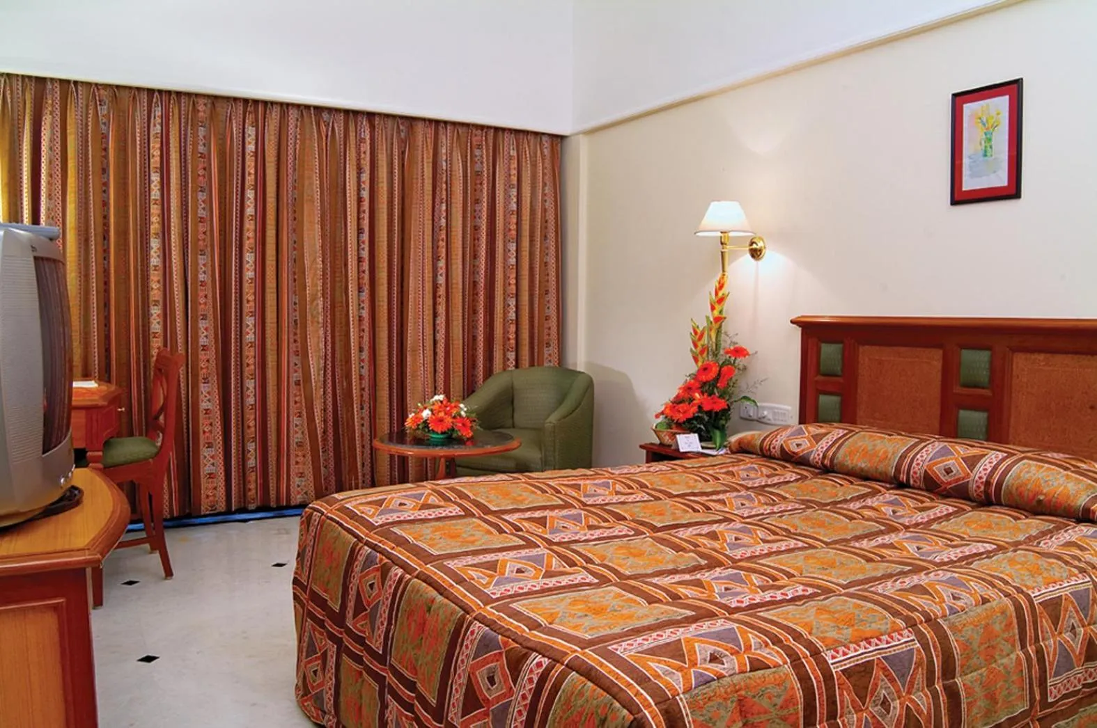 Bedroom, Bed in Regency Kanchipuram by GRT Hotels
