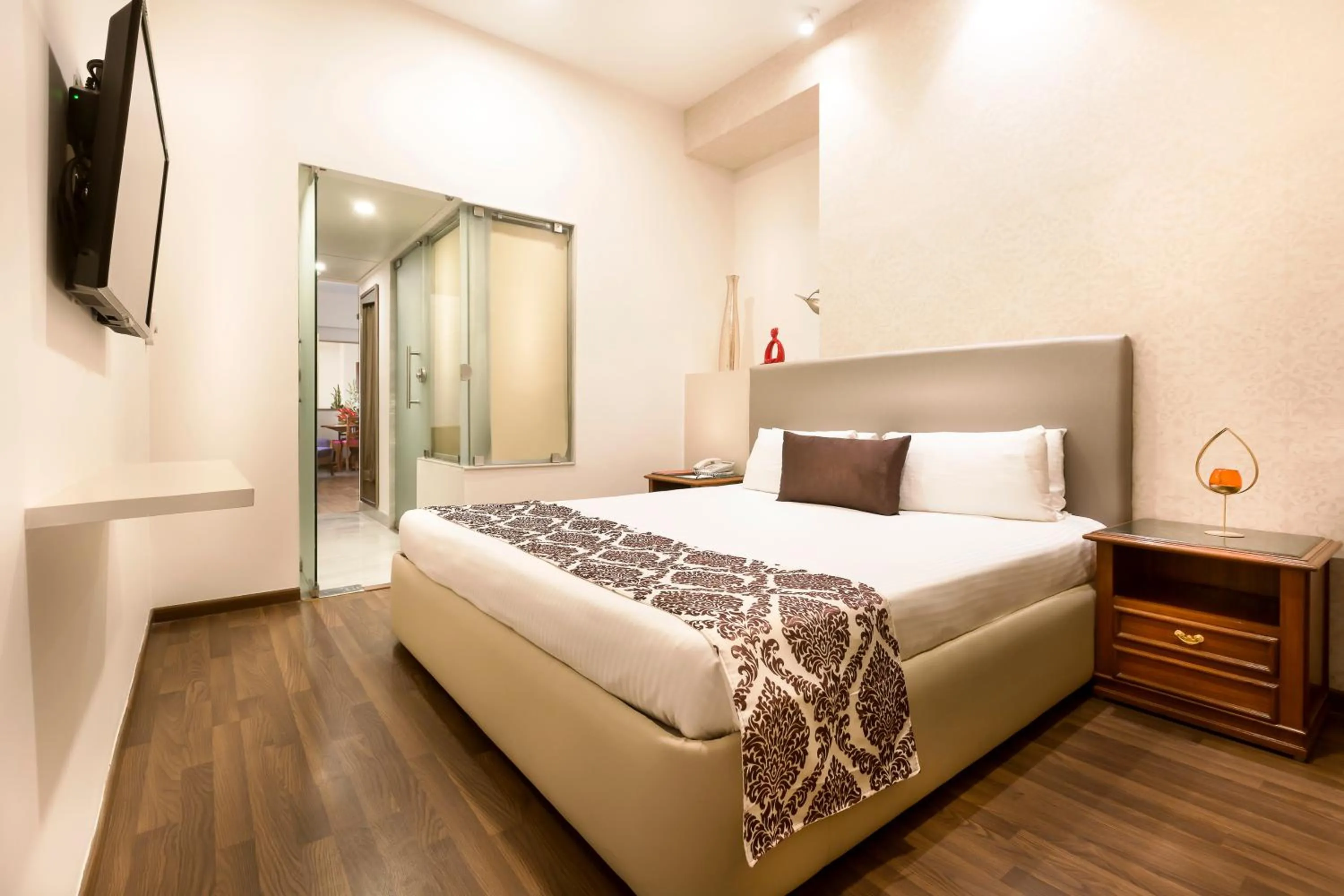 Bed in Regency Kanchipuram by GRT Hotels