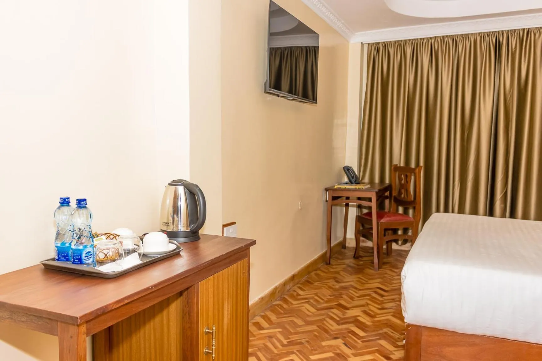 Bed in The Glacier Hotel Nanyuki