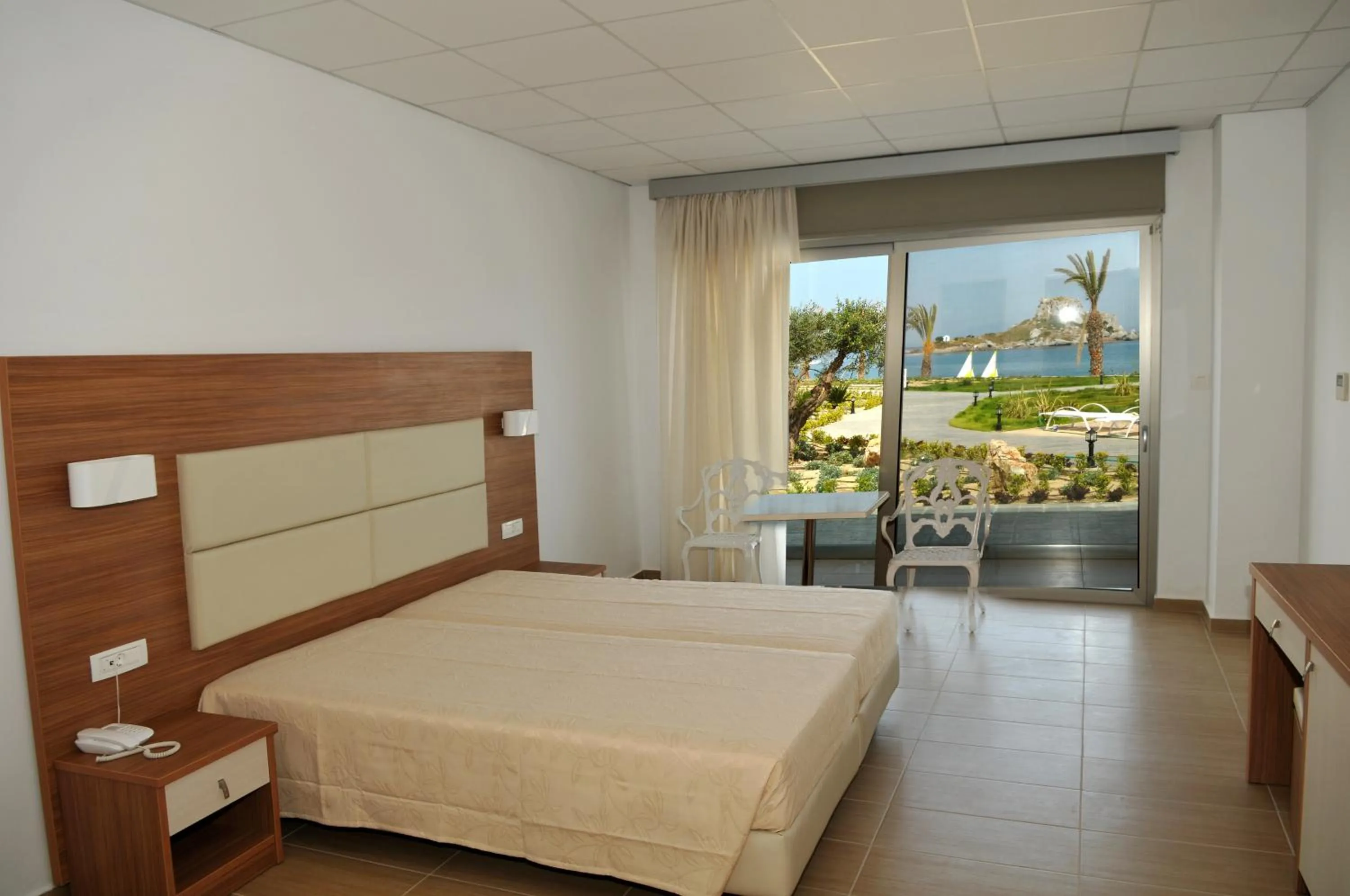 Bed in Royal Bay Suites