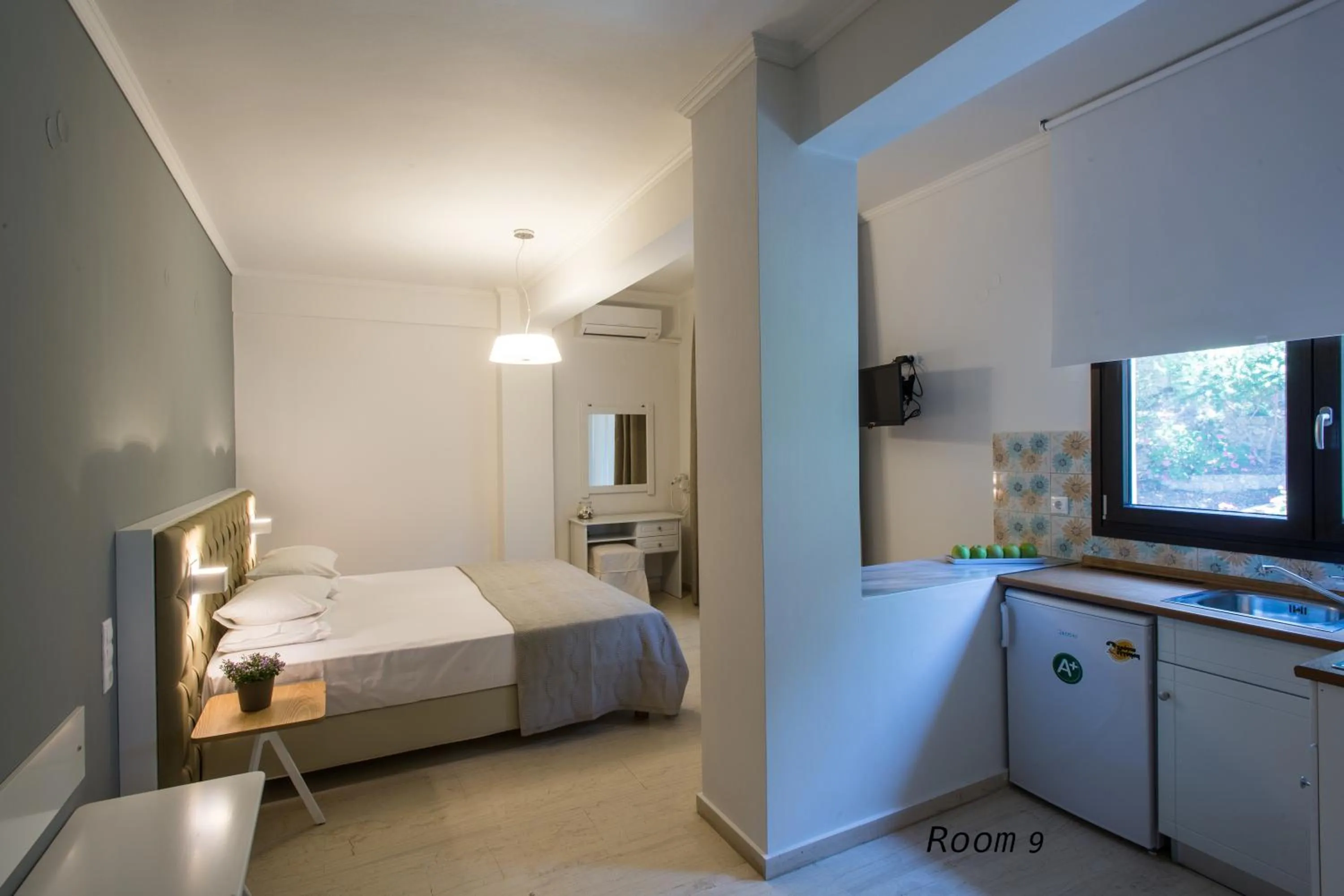 Kitchen or kitchenette, Bed in Hotel Oriana - Adults Only